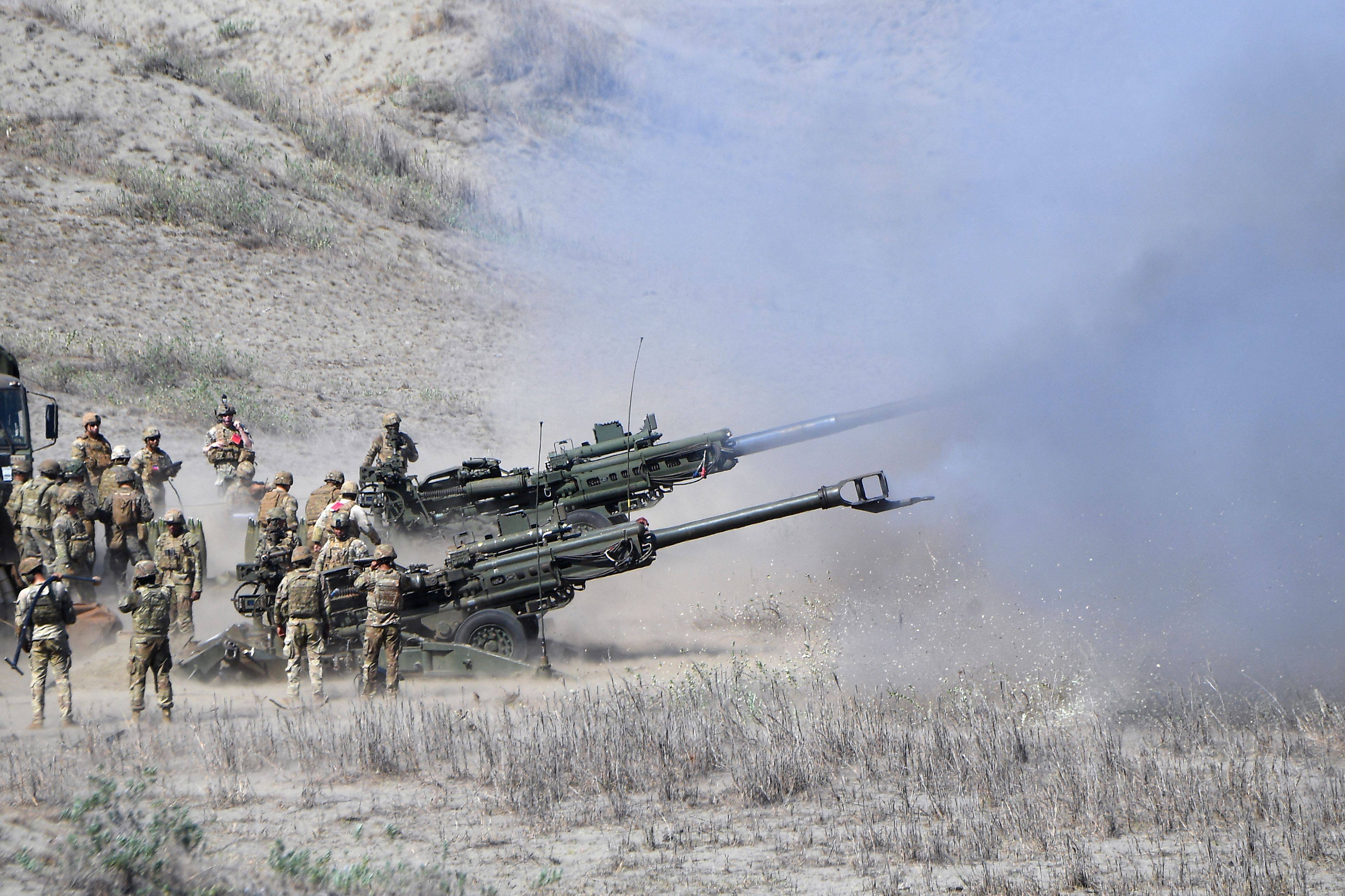 US and Philippine Marines fire Howitzer artillery during a live-fire exercise as part of the joint US-Philippines annual military Balikatan drills in Laoag on Luzon island’s northwest coast in May 2024. Photo: AFP