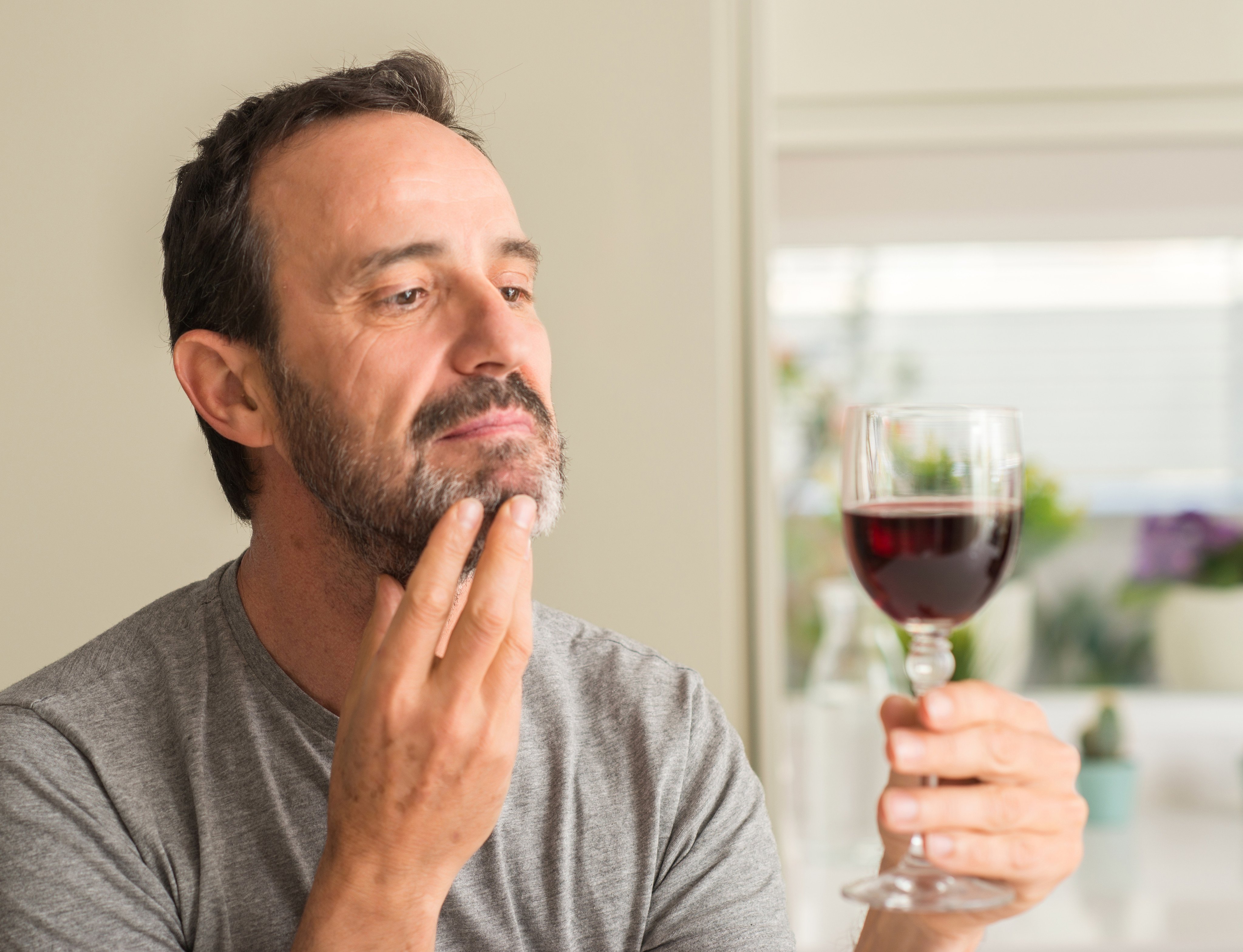 While some studies have shown moderate consumption of alcoholic drinks could have a protective effect on the brain, it may also increase the risk of cancers and, as we age, deadly falls and dementia. Photo: Shutterstock