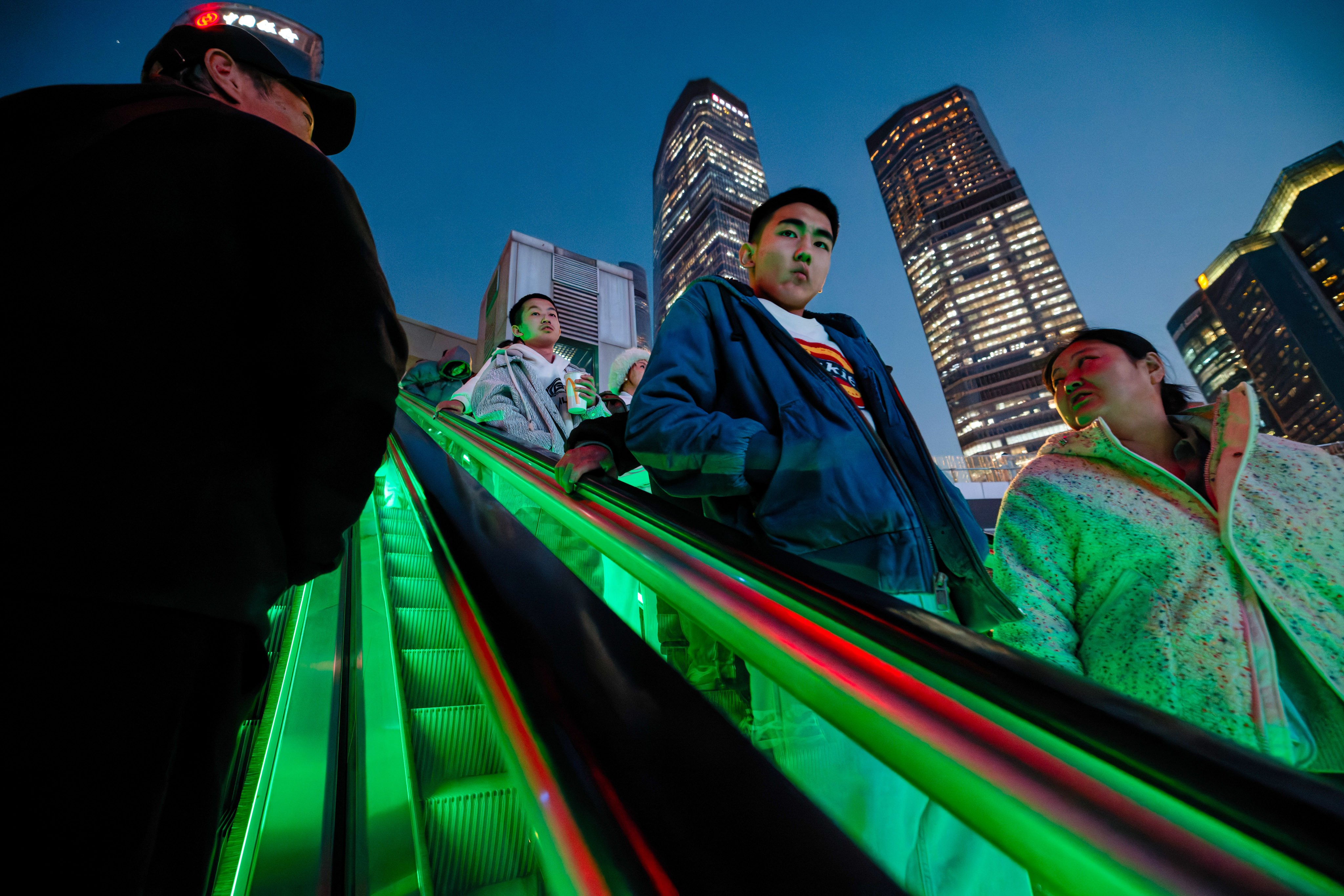 Workers in Chinese financial hubs like Shanghai’s Lujiazui are facing pay cuts and layoffs.  Photo: EPA