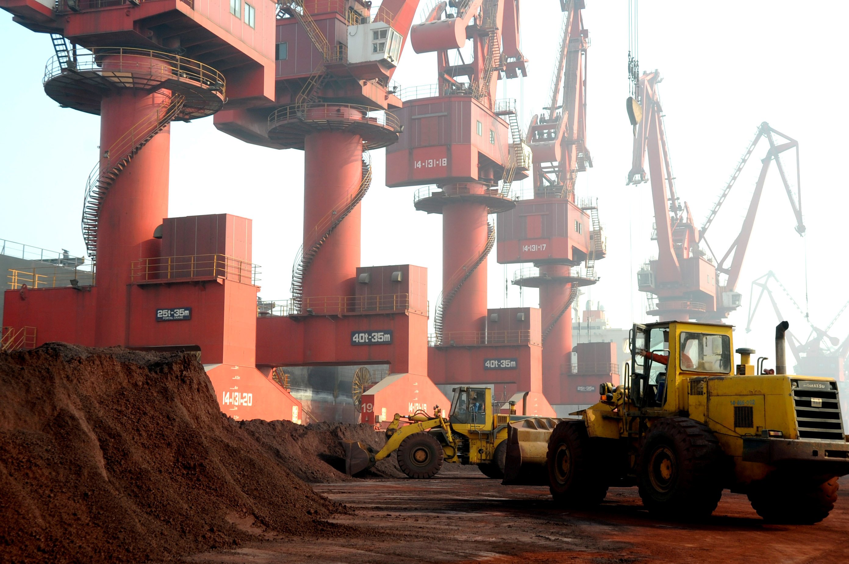 Soil containing rare earth deposits is transported for shipment at a port in Lianyungang, Jiangsu province. China processes 90 per cent of global rare earth supplies. Photo: Reuters