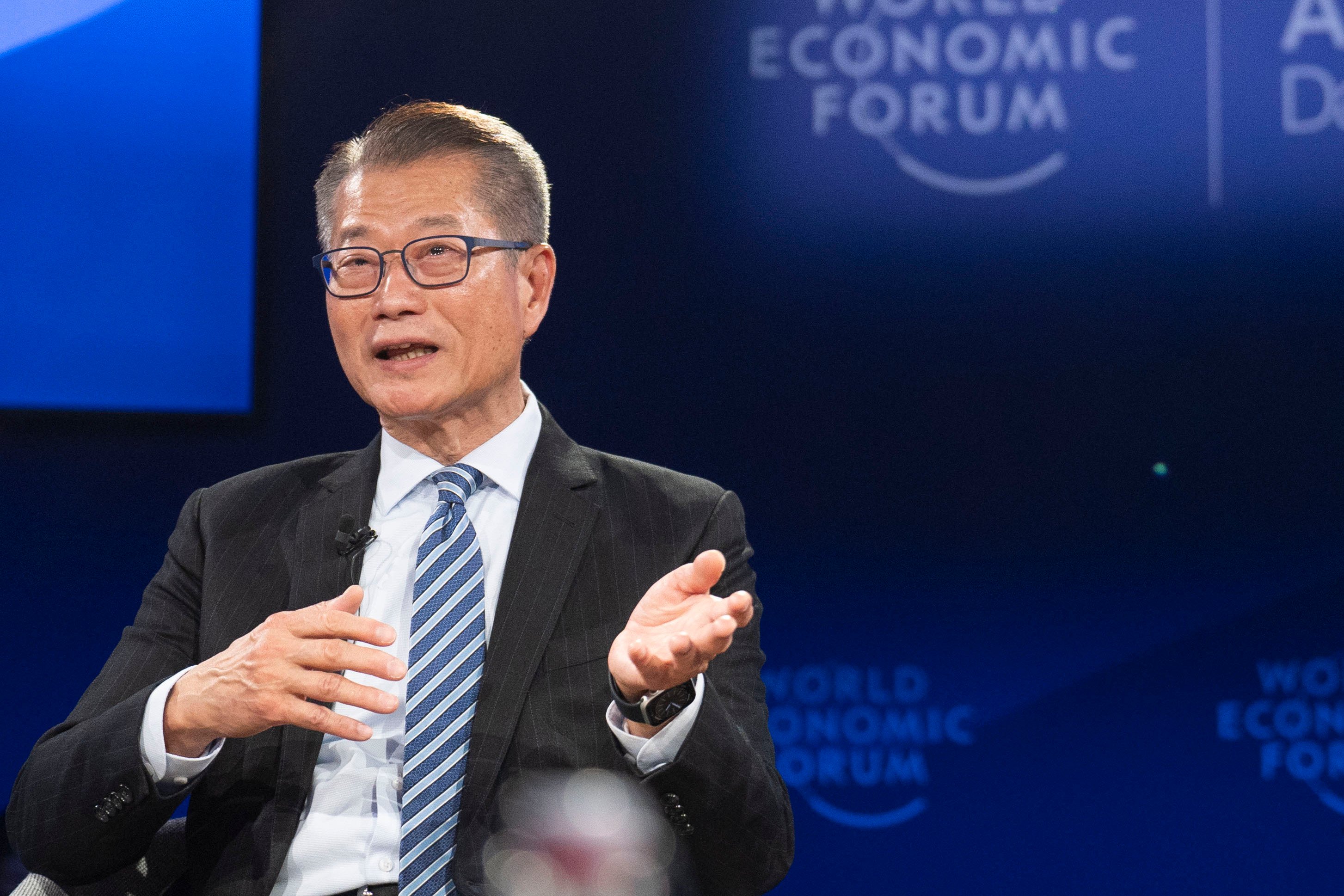 Hong Kong’s finance chief Paul Chan speaks at a panel discussion at the World Economic Forum in Davos. Photo: World Economic Forum