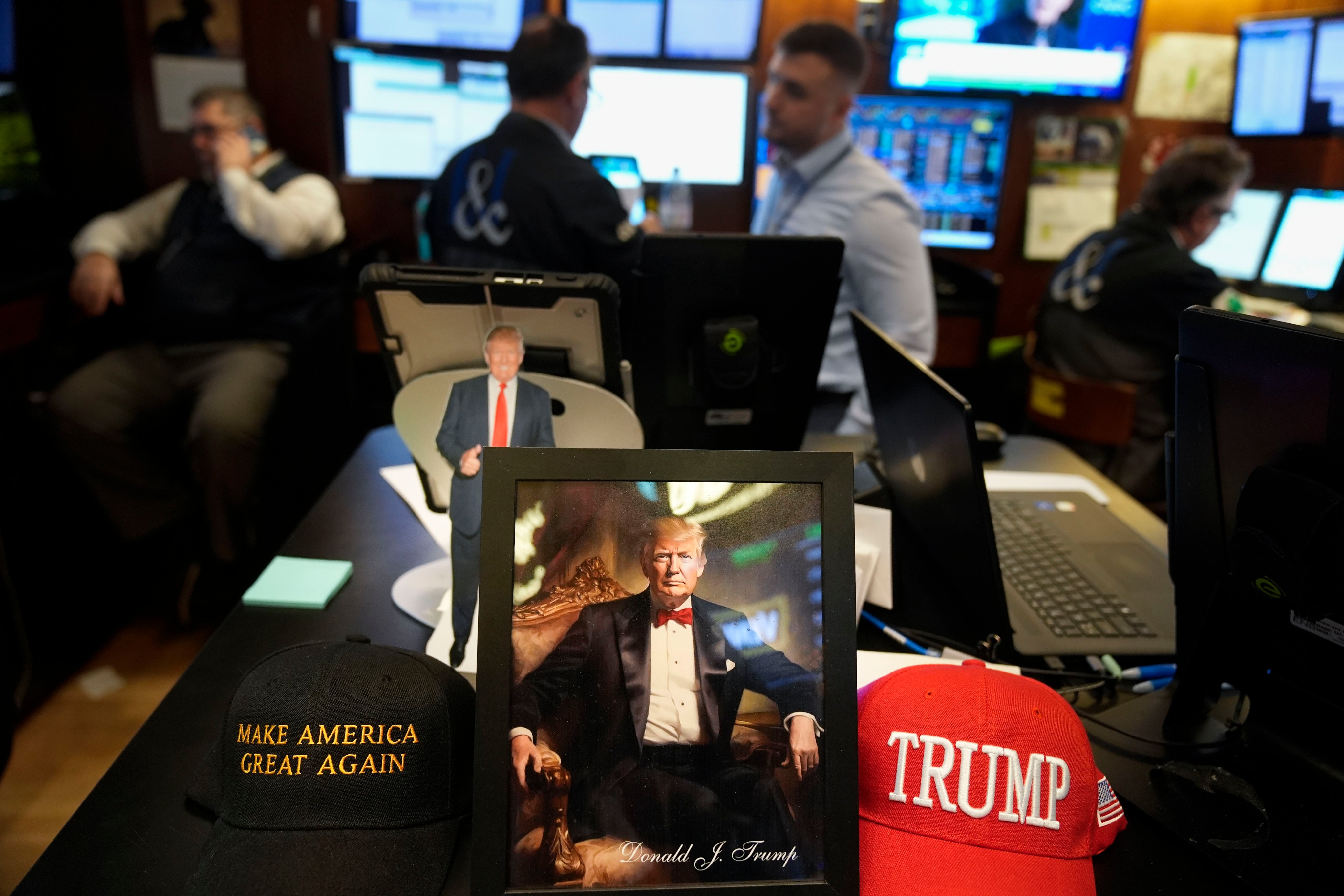 Paraphernalia supporting President Donald Trump is displayed at a post on the floor of the New York Stock Exchange on January 21, 2025. Photo: AP 