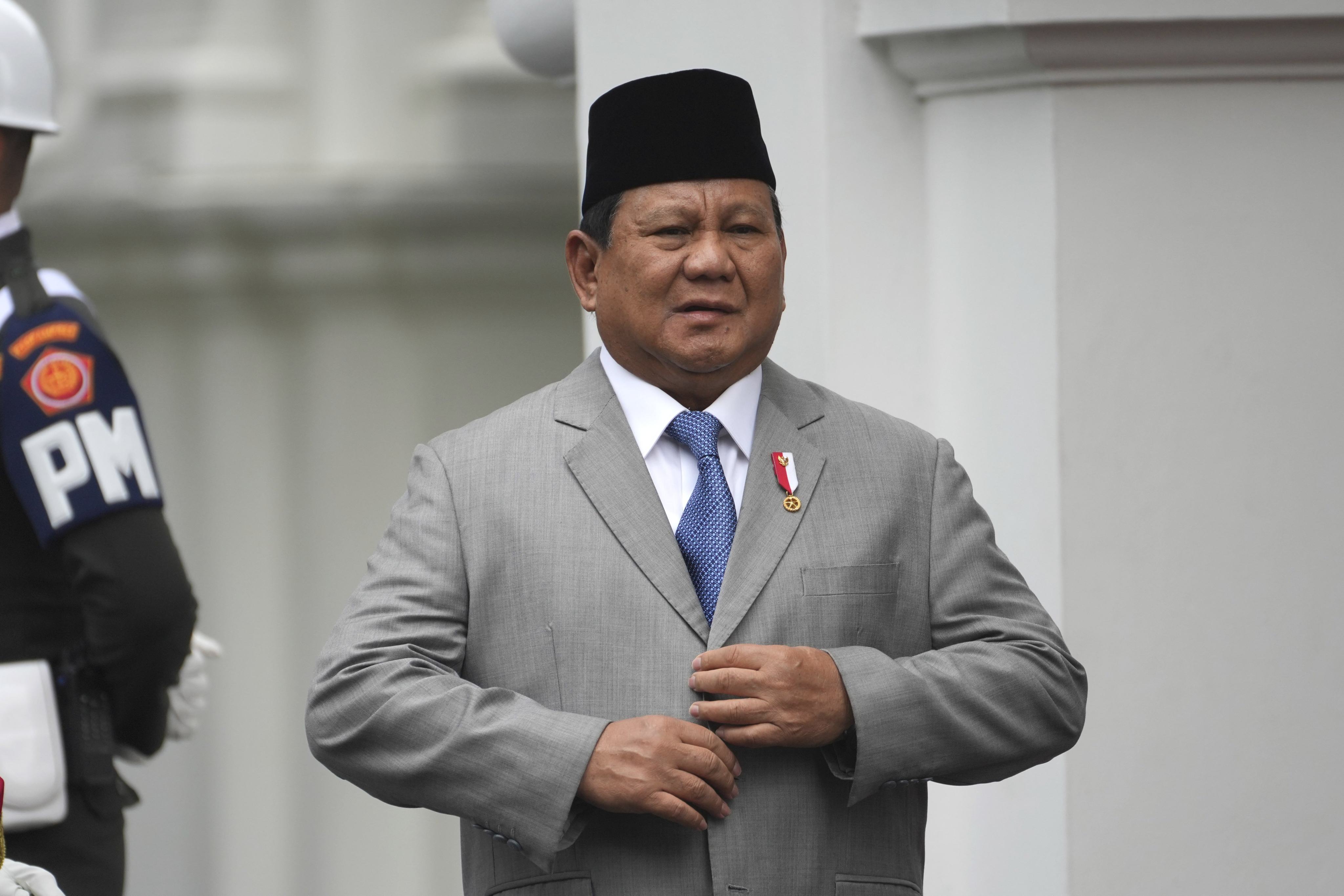 Indonesian President Prabowo Subianto prepares to welcome Singaporean Prime Minister Lawrence before their meeting in Jakarta in November. Photo: AP