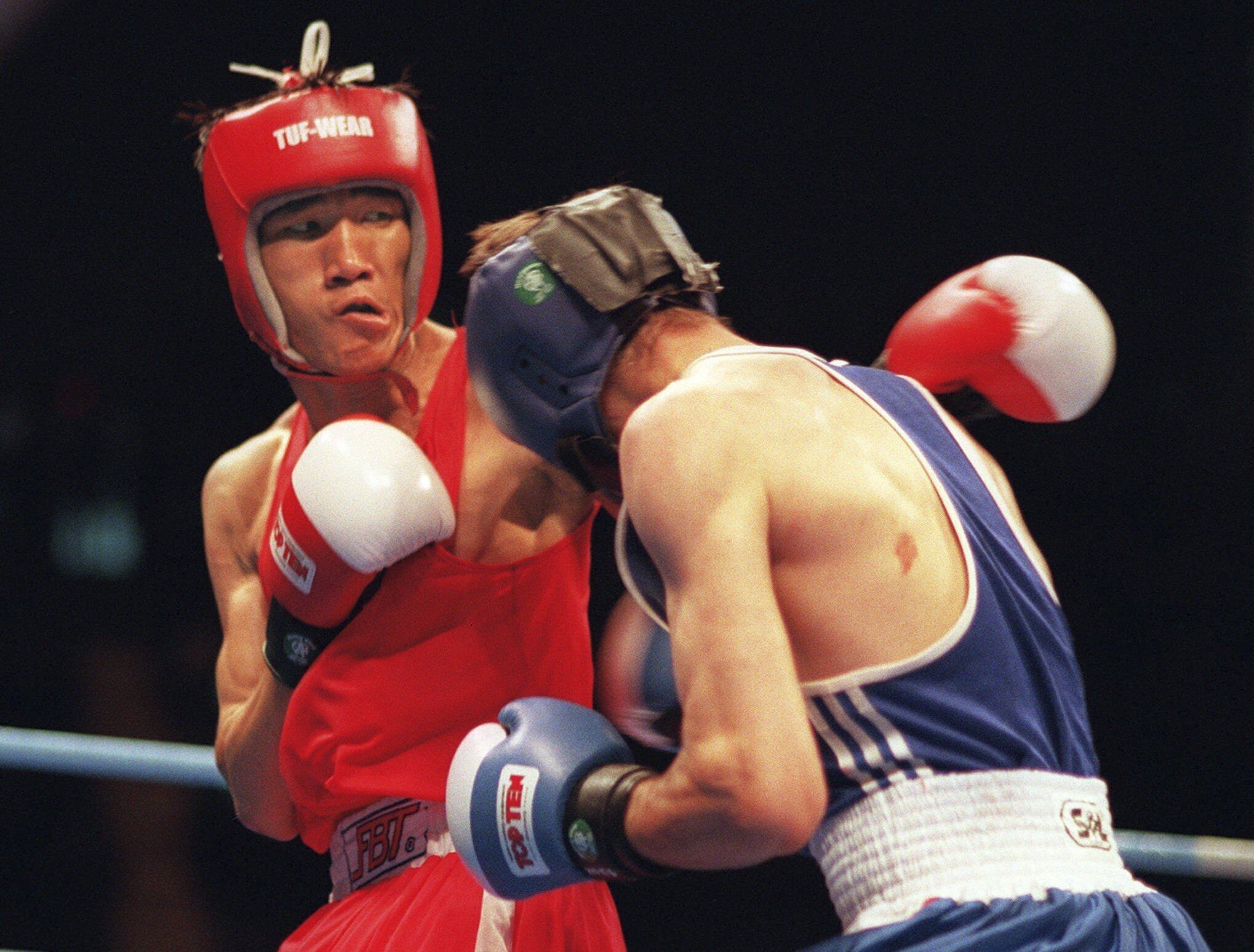 FILE - Thailand’s Somluck Kamsing (left) won gold at the Atlanta Games in 1996. Photo: AP