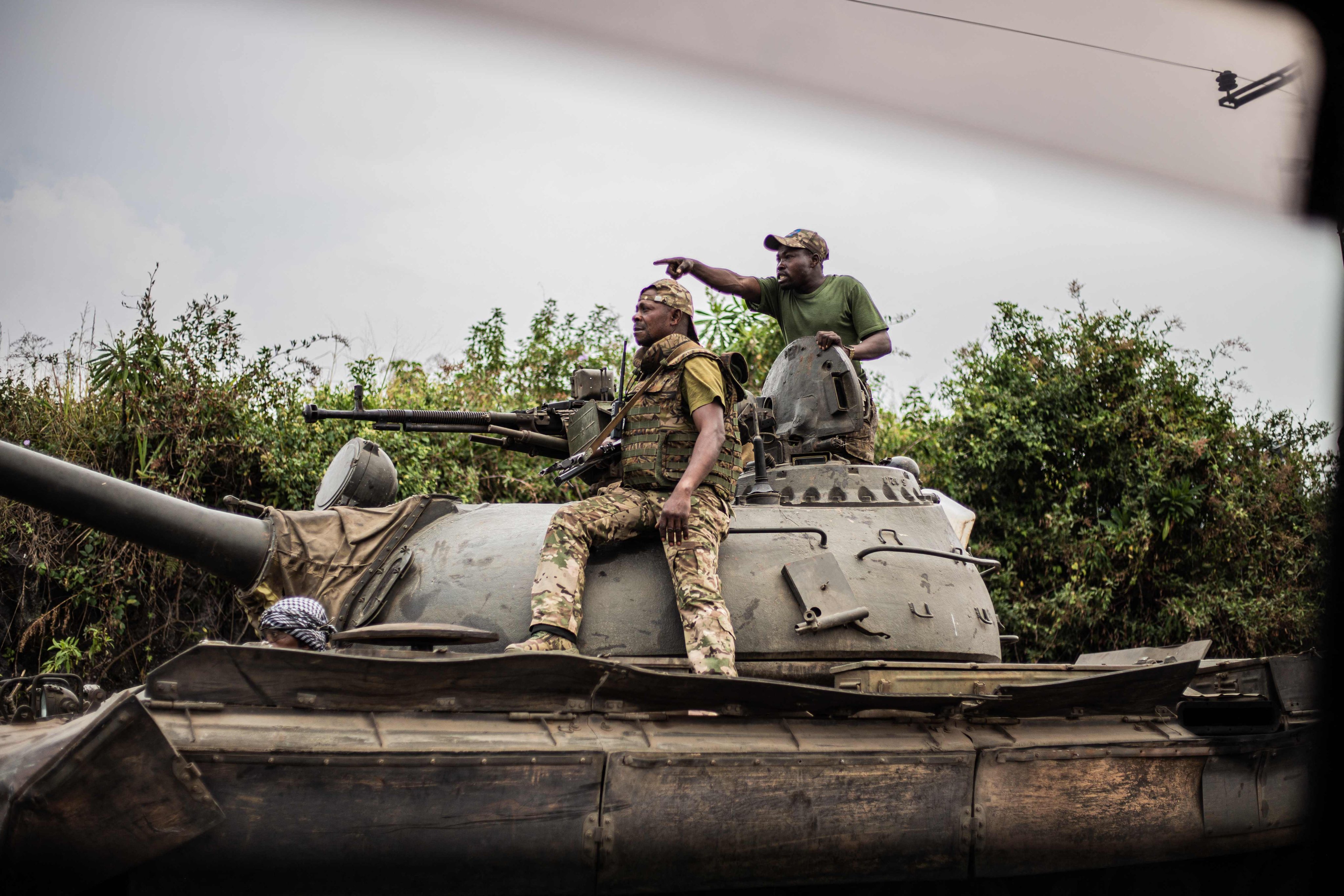 Congolese soldiers on top of a tank advancing towards Sake, 25km northwest of Goma. Photo: AFP