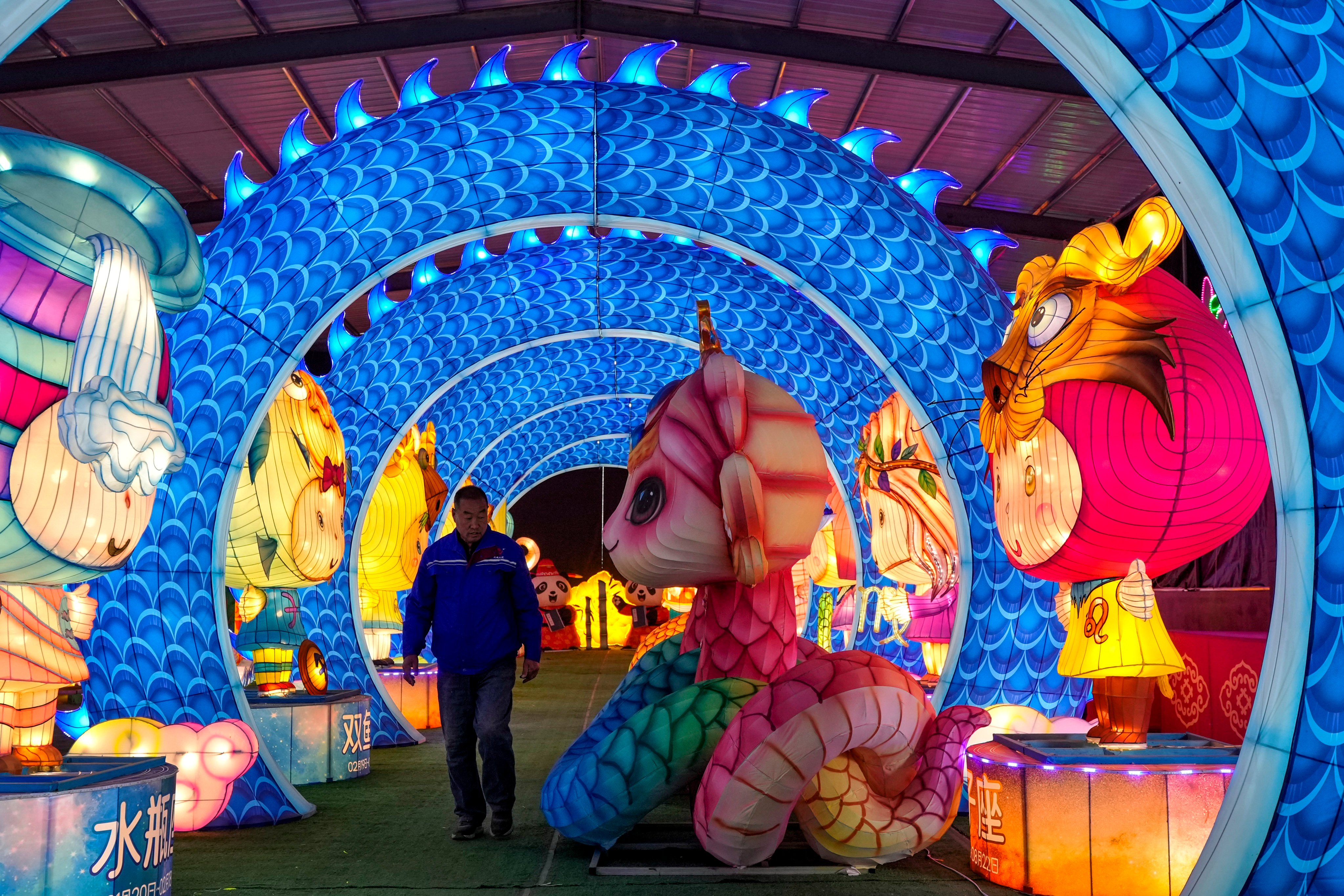 Vibrant snake lanterns with cartoonish features are crafted in China, symbolising good luck and challenging traditional snake perceptions. Photo: AP