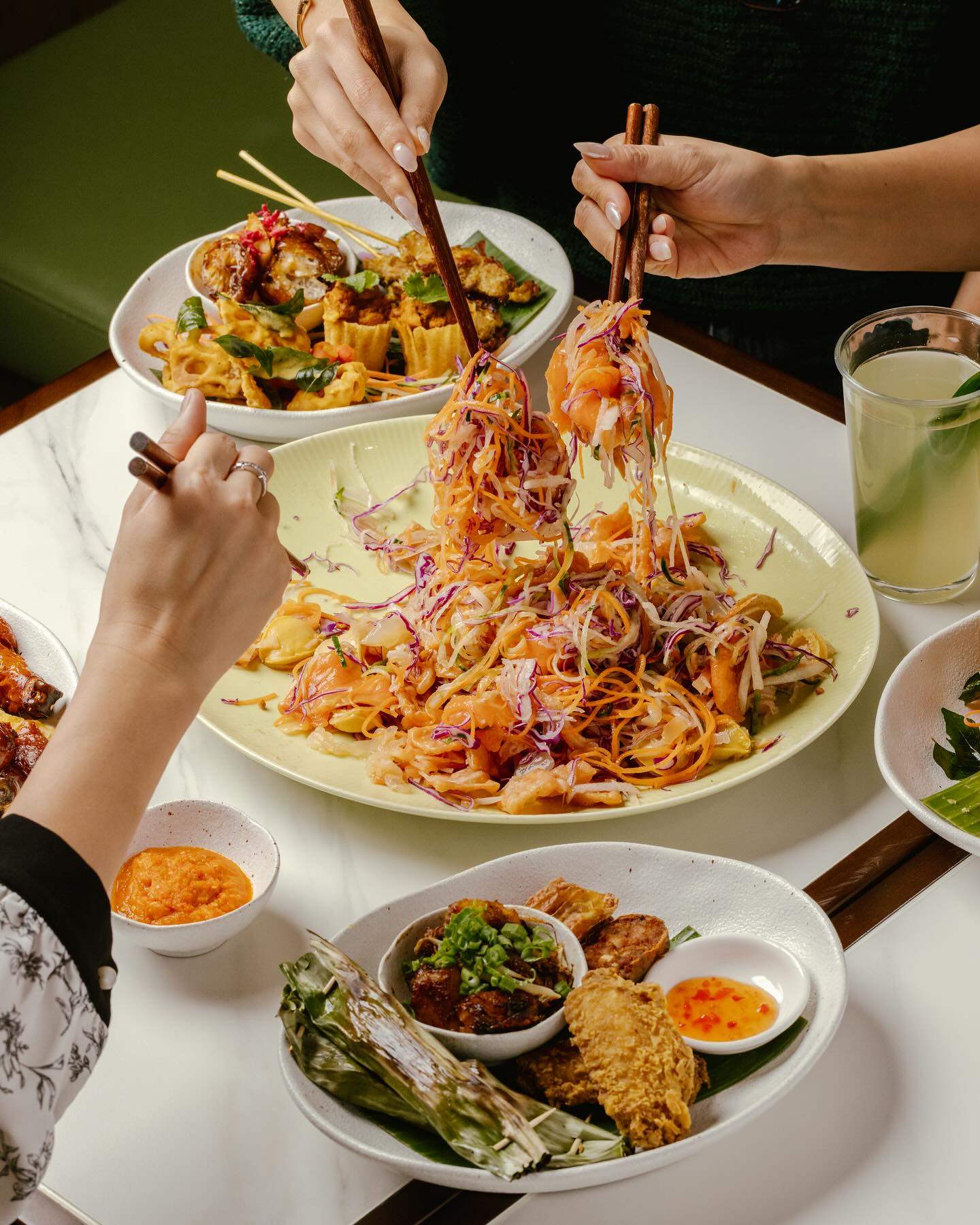 The prosperity toss salad, called yusheng or lo hei in Chinese, served at Jom, a modern Singaporean restaurant in Hong Kong. Diners mix and toss the salad while repeating Chinese new year good luck sayings. Photo: Instagram/@eat.jom