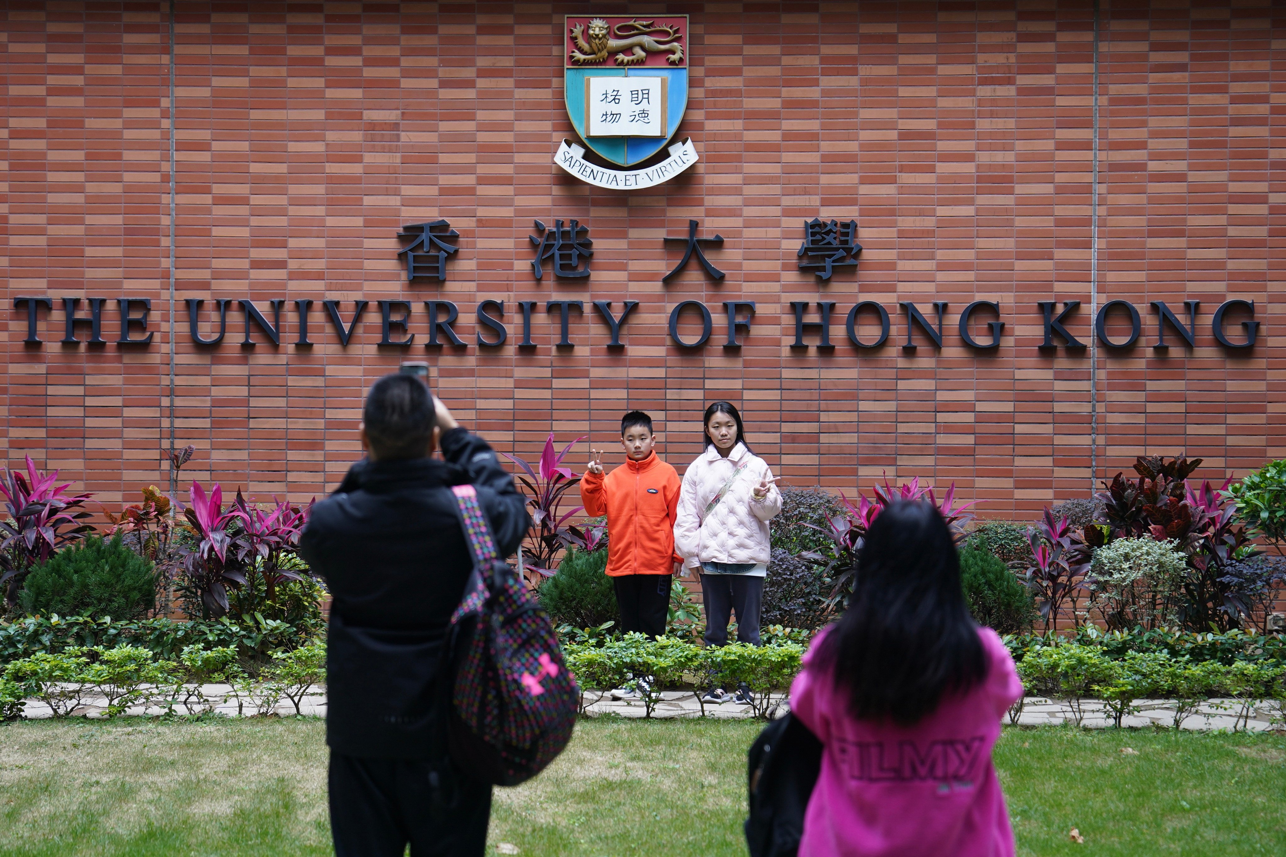 Visitors pose for pictures at the University of Hong Kong. Photo: Elson Li