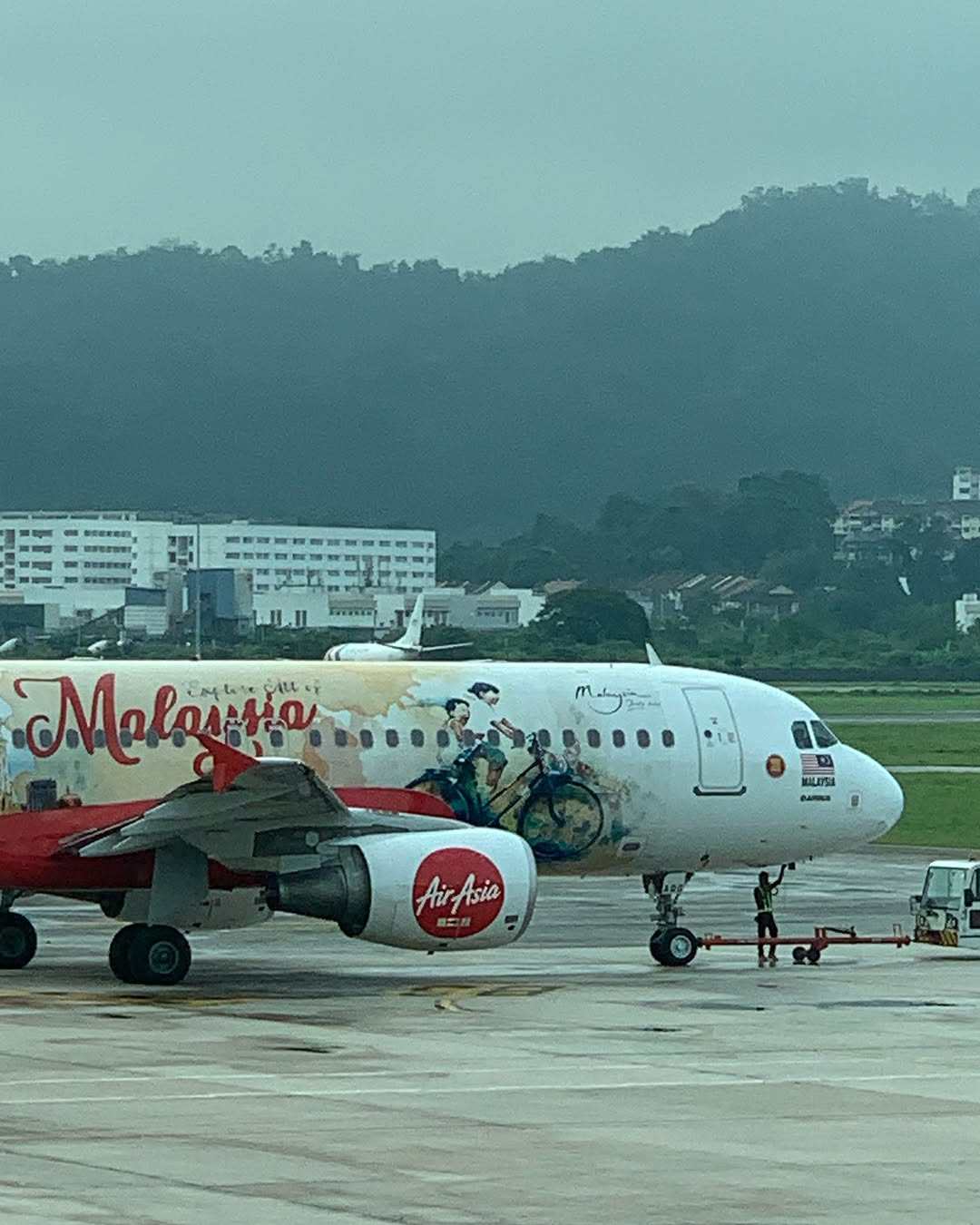 An AirAsia aircraft featuring Ernest Zacharevic’s artwork. Photo: Instagram/ernestzacharevic
