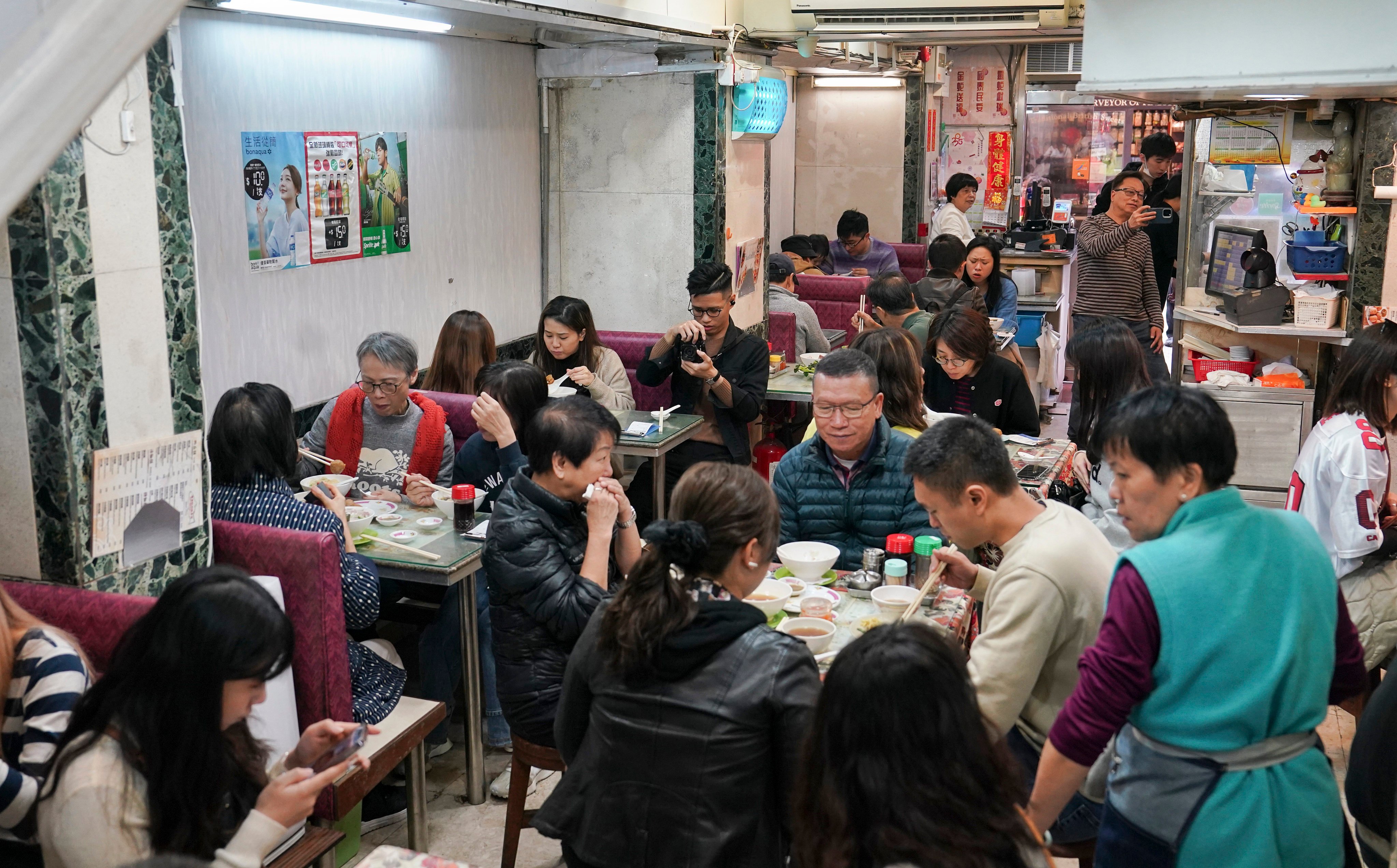 Diners pack into one of the Law Fu Kee Restaurant branches in Central. Photo: Elson Li