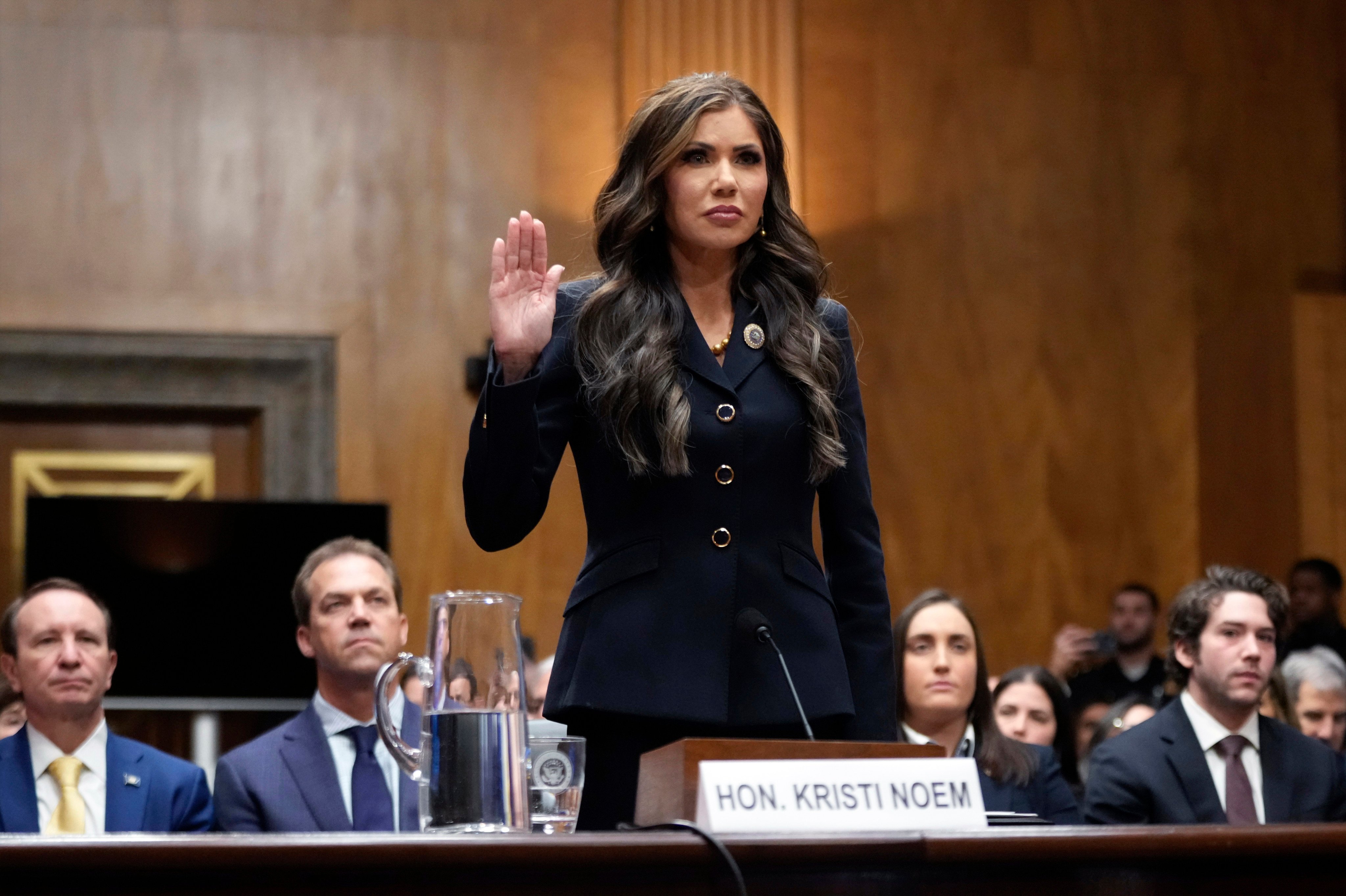 Kristi Noem is sworn in before the Senate Homeland Security and Governmental Affairs Committee for her confirmation hearing in Washington on January 17. Photo: AP