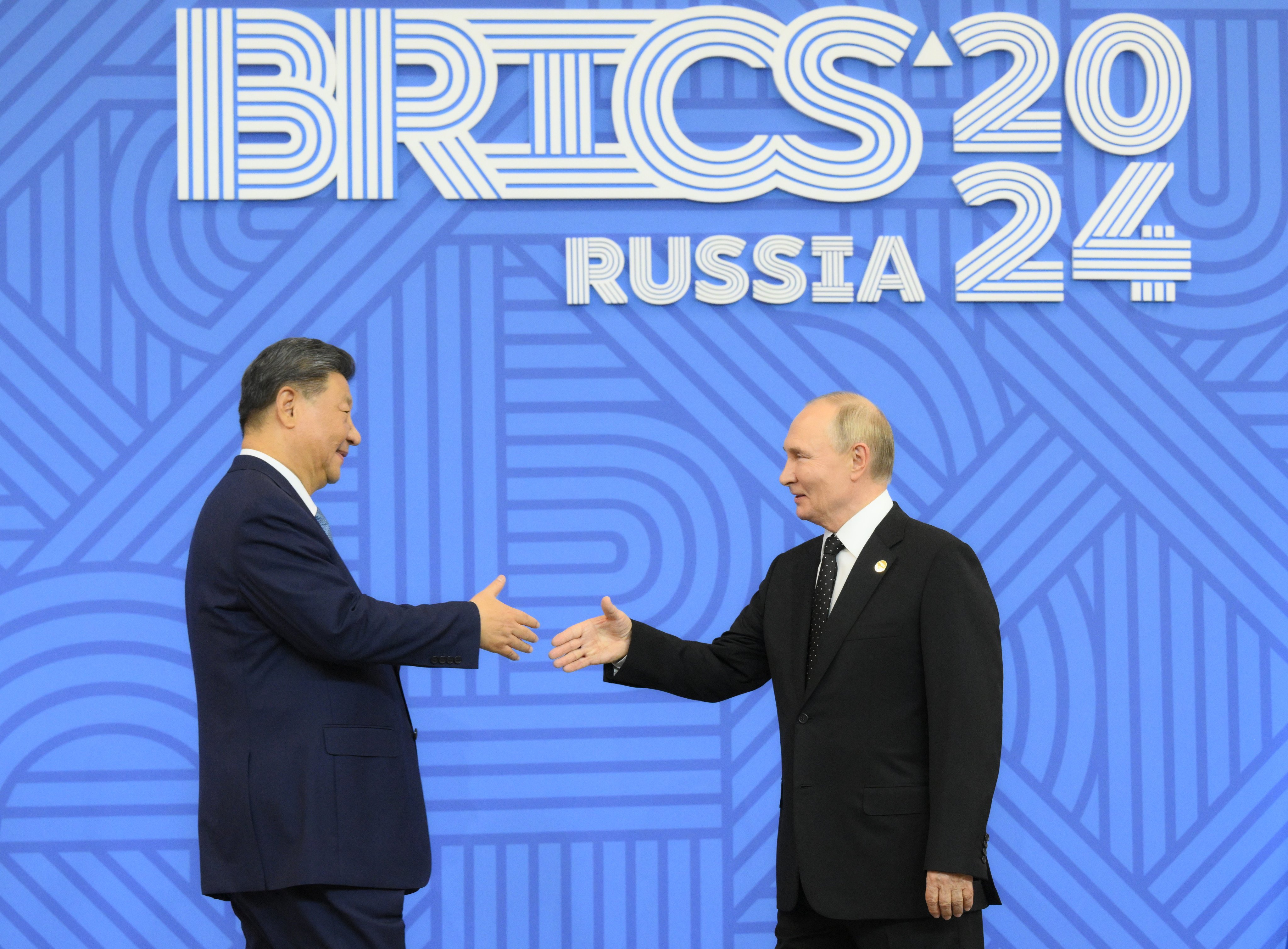 Russian President Vladimir Putin (right) welcomes President Xi Jinping at the Brics Summit in Kazan, Russia, on October 23, 2024. Photo: dpa