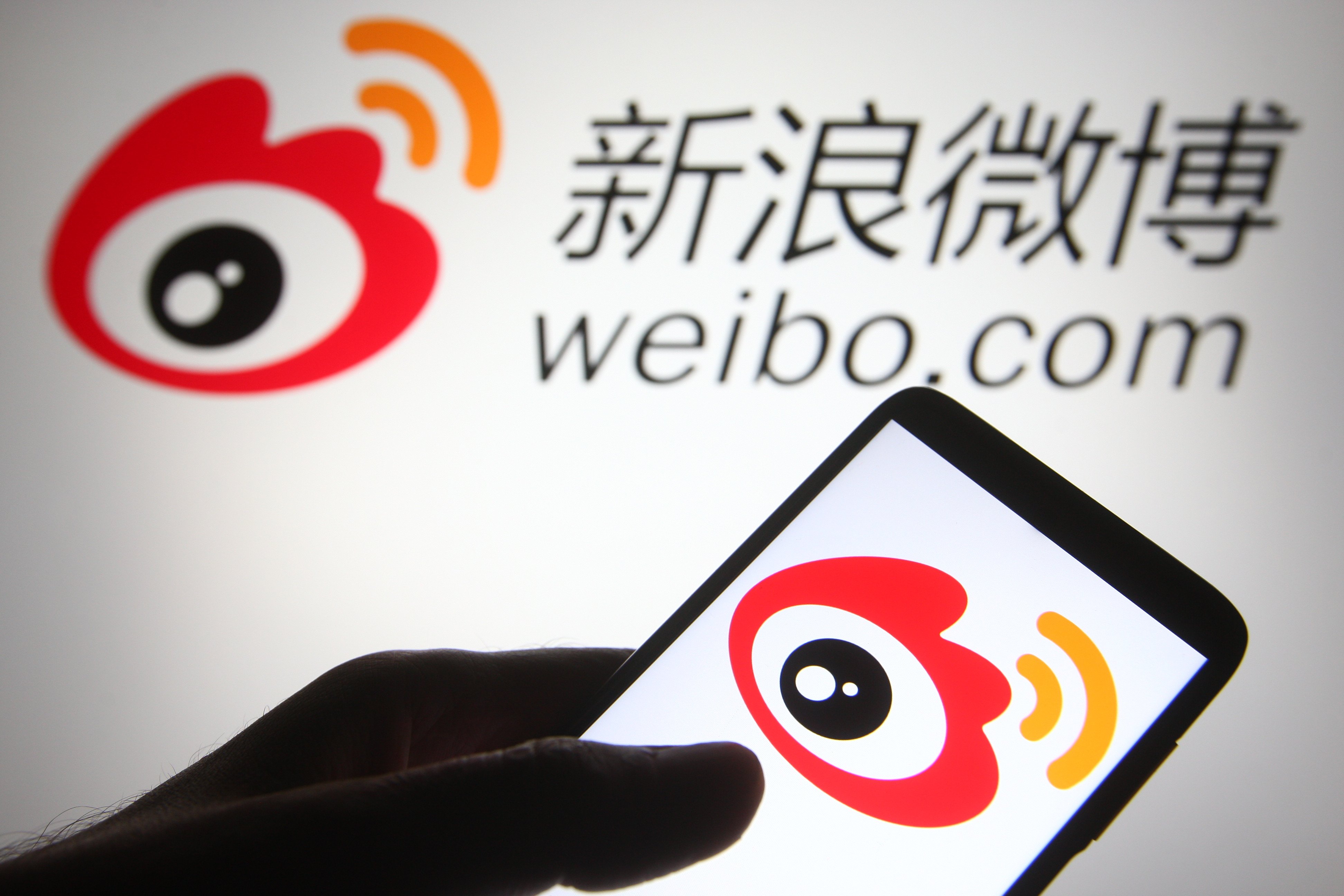 The Weibo logo is seen on a smartphone in this arranged illustration. Photo: Shutterstock Images