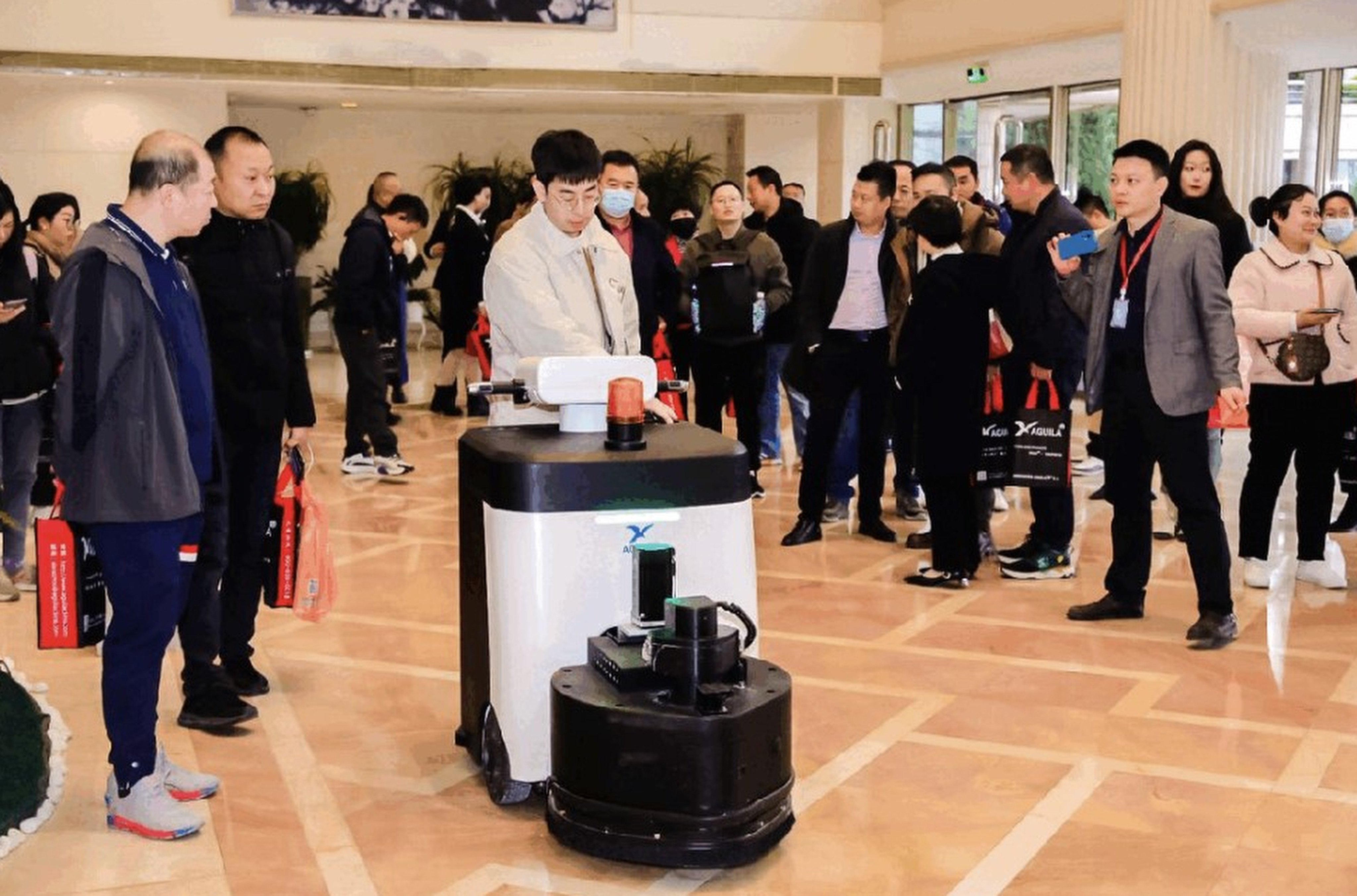 Suzhou Intelligence Technology’s commercial-grade cleaning robot shown at an event. Photo: Suzhou Intelligence Technology