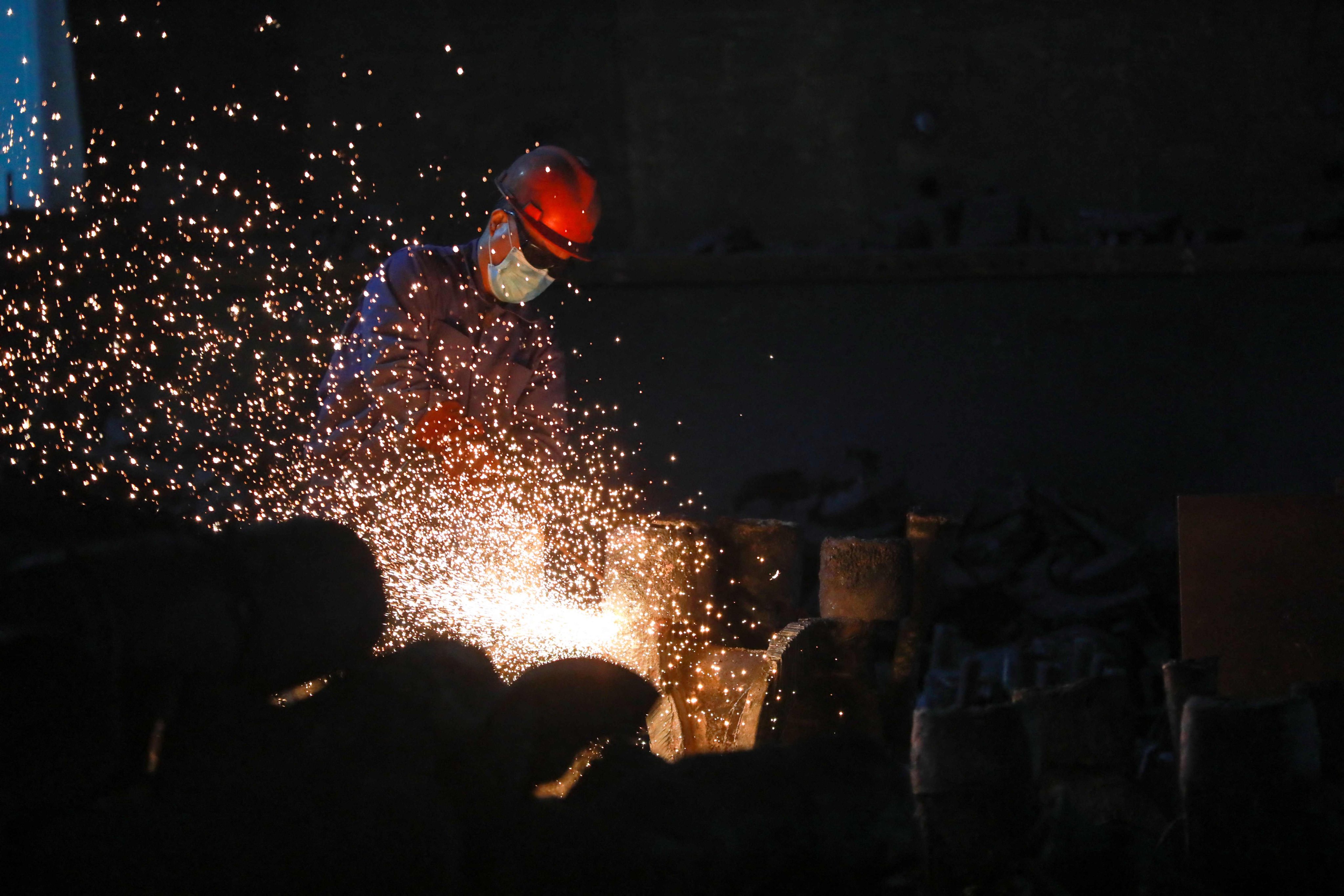 China has reported its purchasing managers’ index for January, a major gauge of industrial activity. Photo: AFP