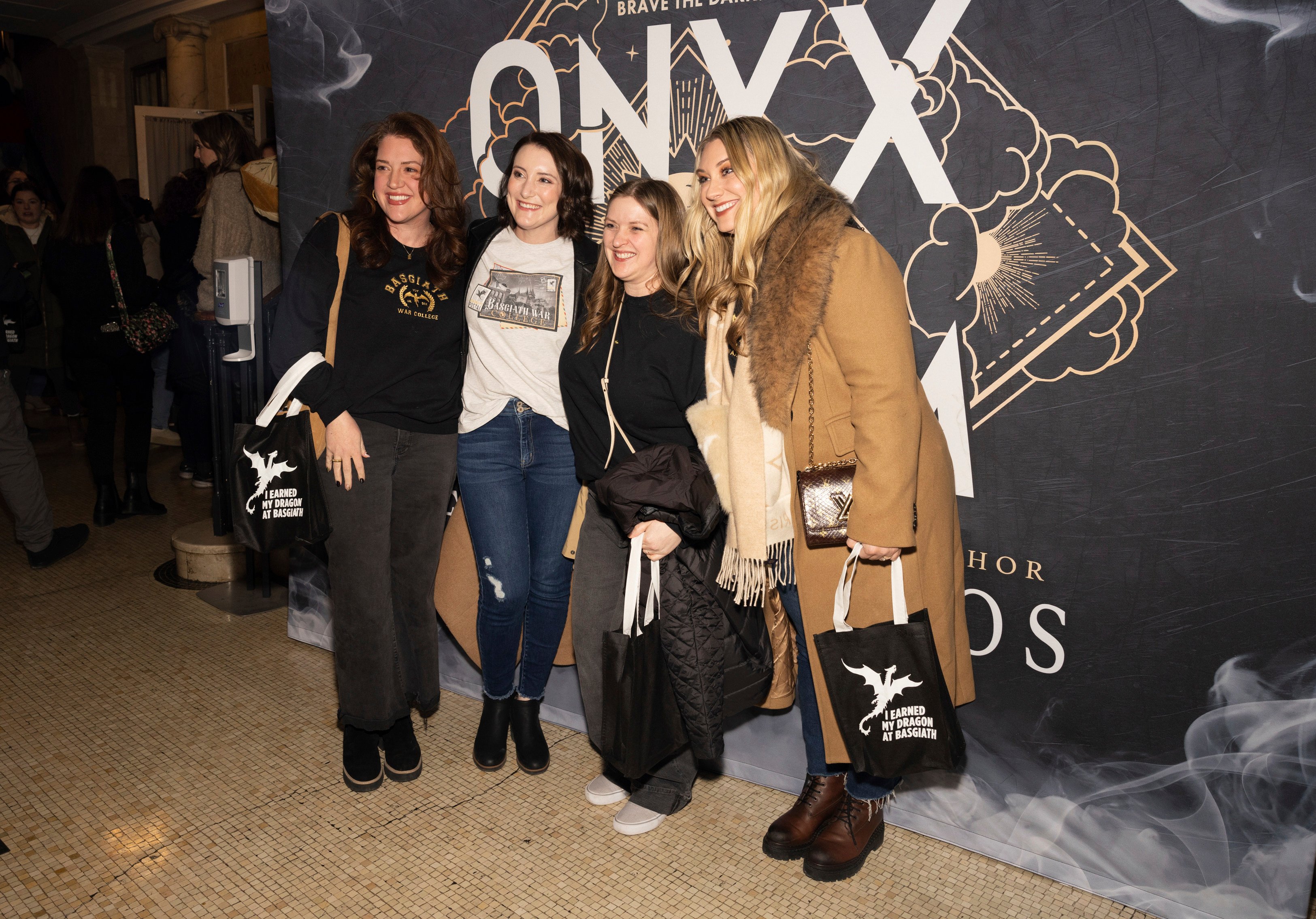 Rebecca Yarros (right) takes photos with audience members who attended a fan event at The Town Hall in Manhattan, New York, about Yarros’ new book Onyx Storm, on January 24, 2025. Photo: CJ Rivera/Invision/AP