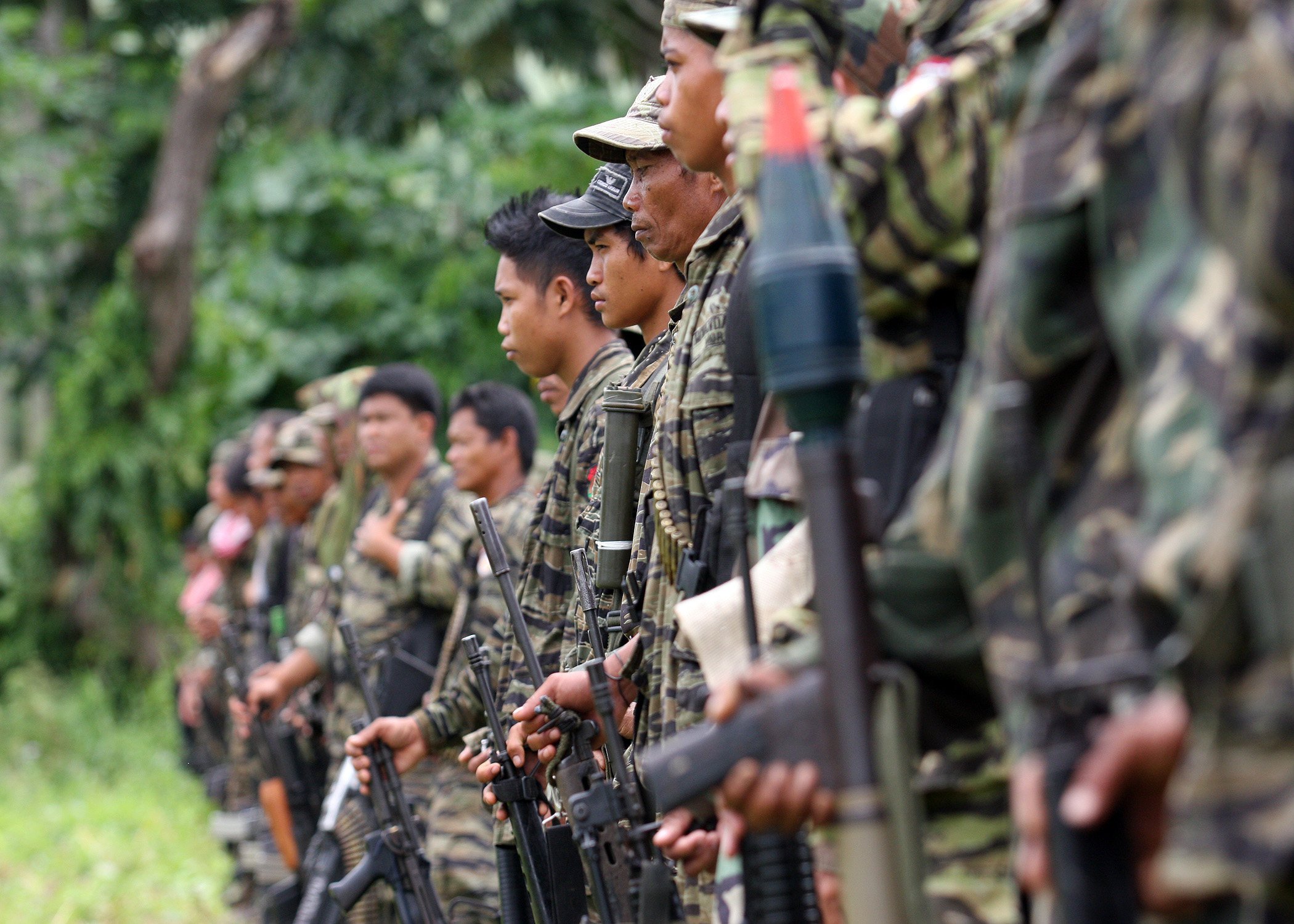 Former rebels belonging to Moro Islamic Liberation Front are seen inside a camp in Sultan Kudarat, Mindanao. Photo: Jeoffrey Maitem