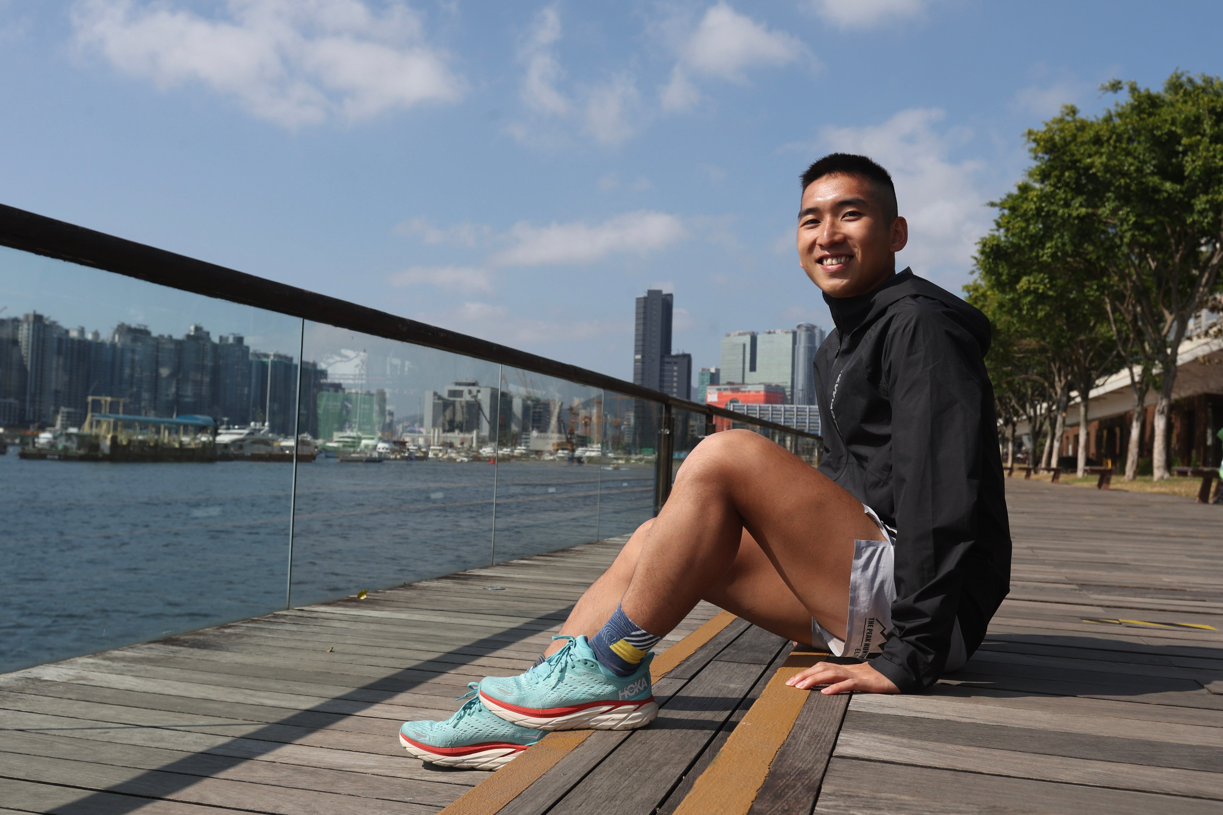 Four Trails runner Glen Yick takes a break from training at Kwun Tong Promenade. Photo: Edmond So