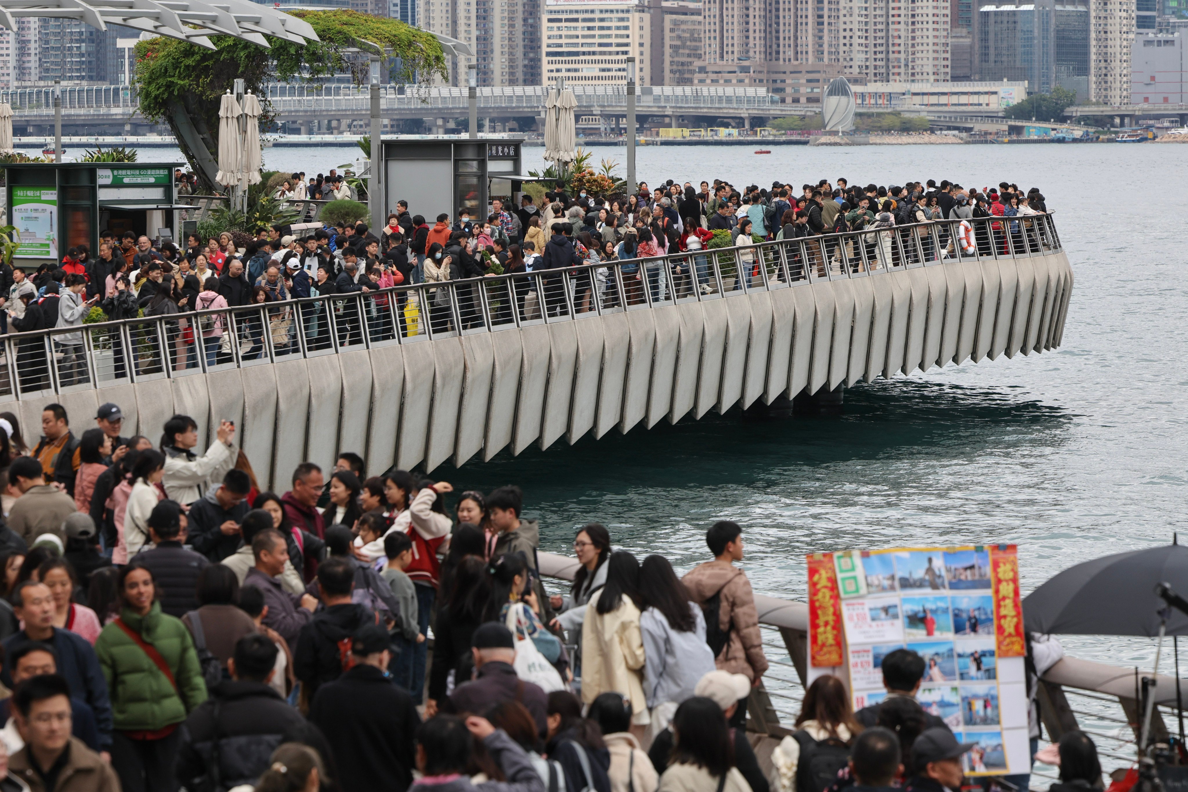 Tourists and residents visit the Avenue of Stars in Tsim Sha Tsui on January 26, during the run up to Lunar New Year. Photo: Dickson Lee