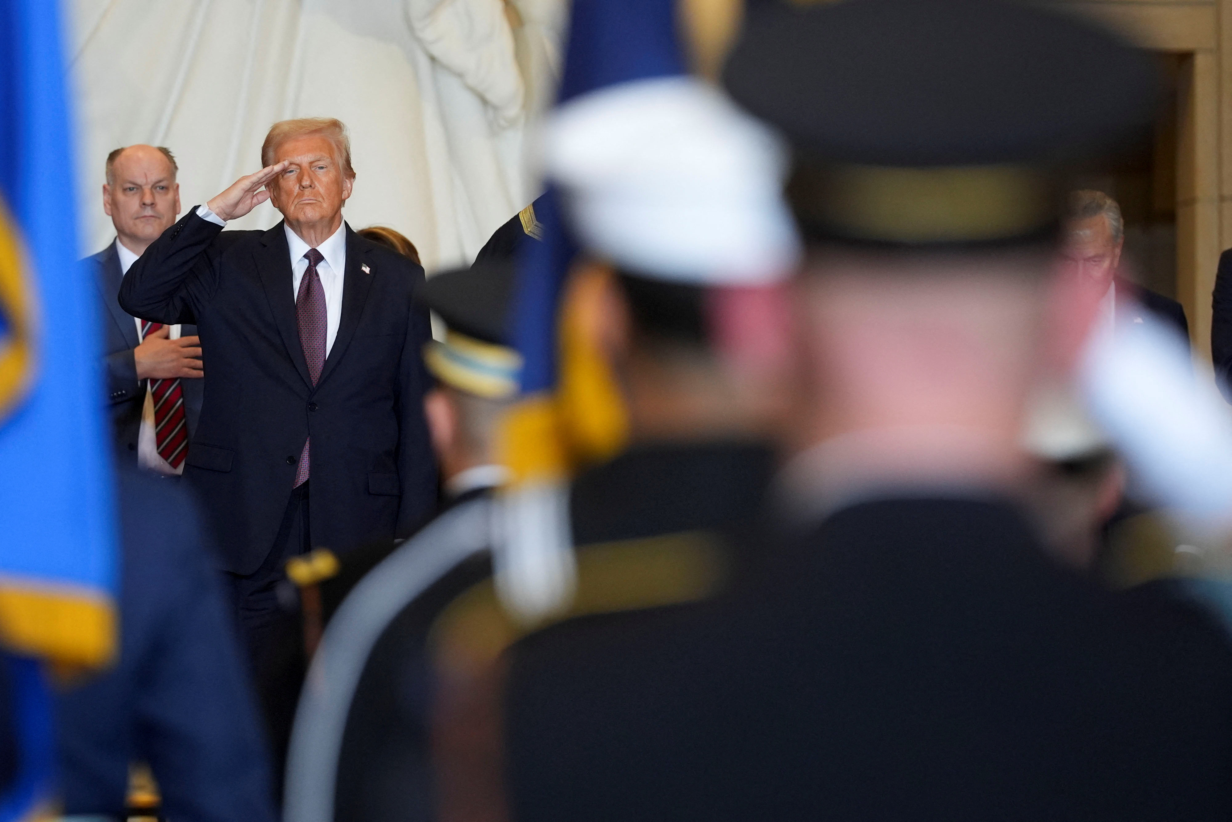 US President Donald Trump salutes while inspecting the troops during his inauguration in Washington on January 20. Photo: Reuters