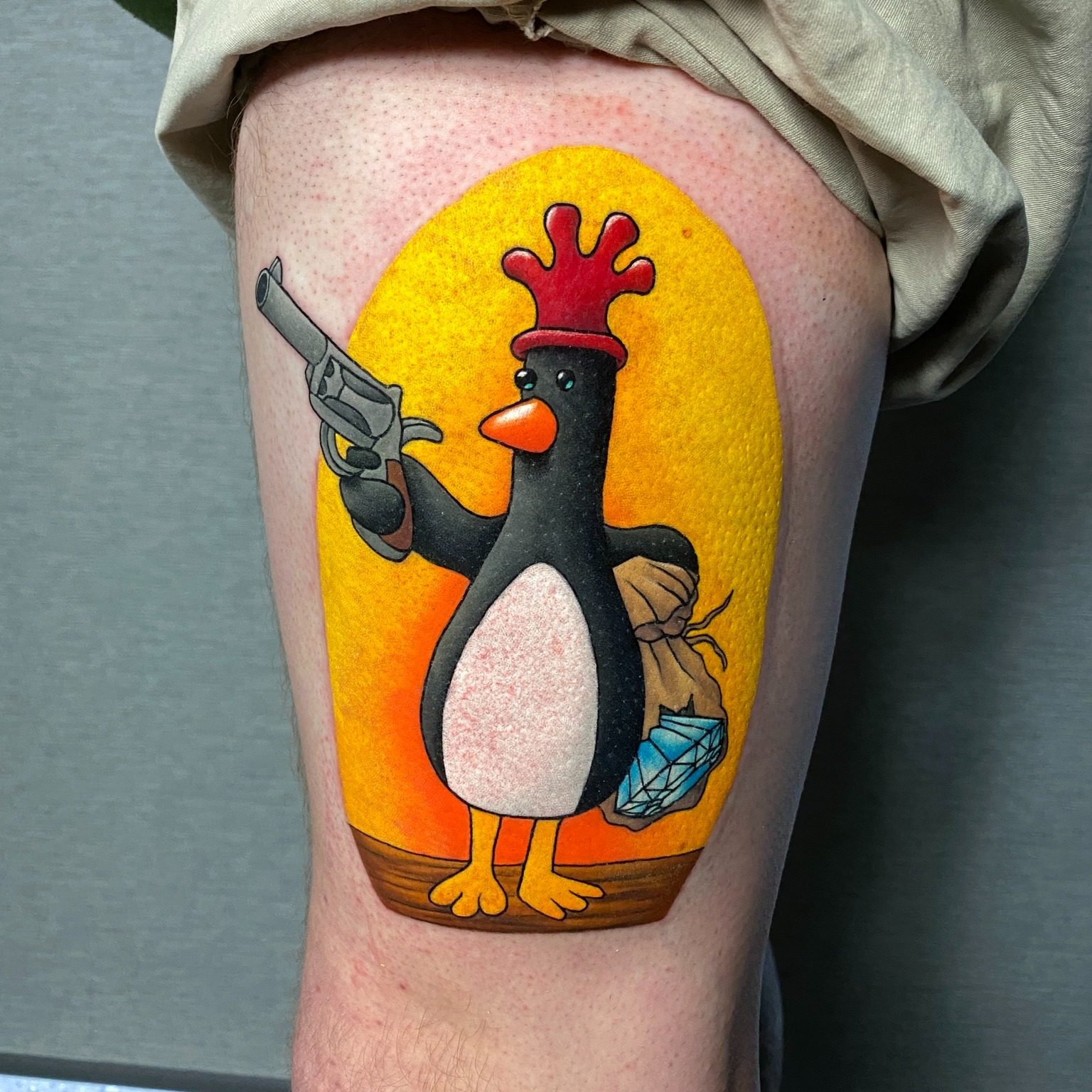 A tattoo of Feathers McGraw, the villain from the Wallace & Gromit animated films. Fans around the world are getting tattooed with images of the evil silent penguin character. Photo: Instagram/lefthandpathtattoos