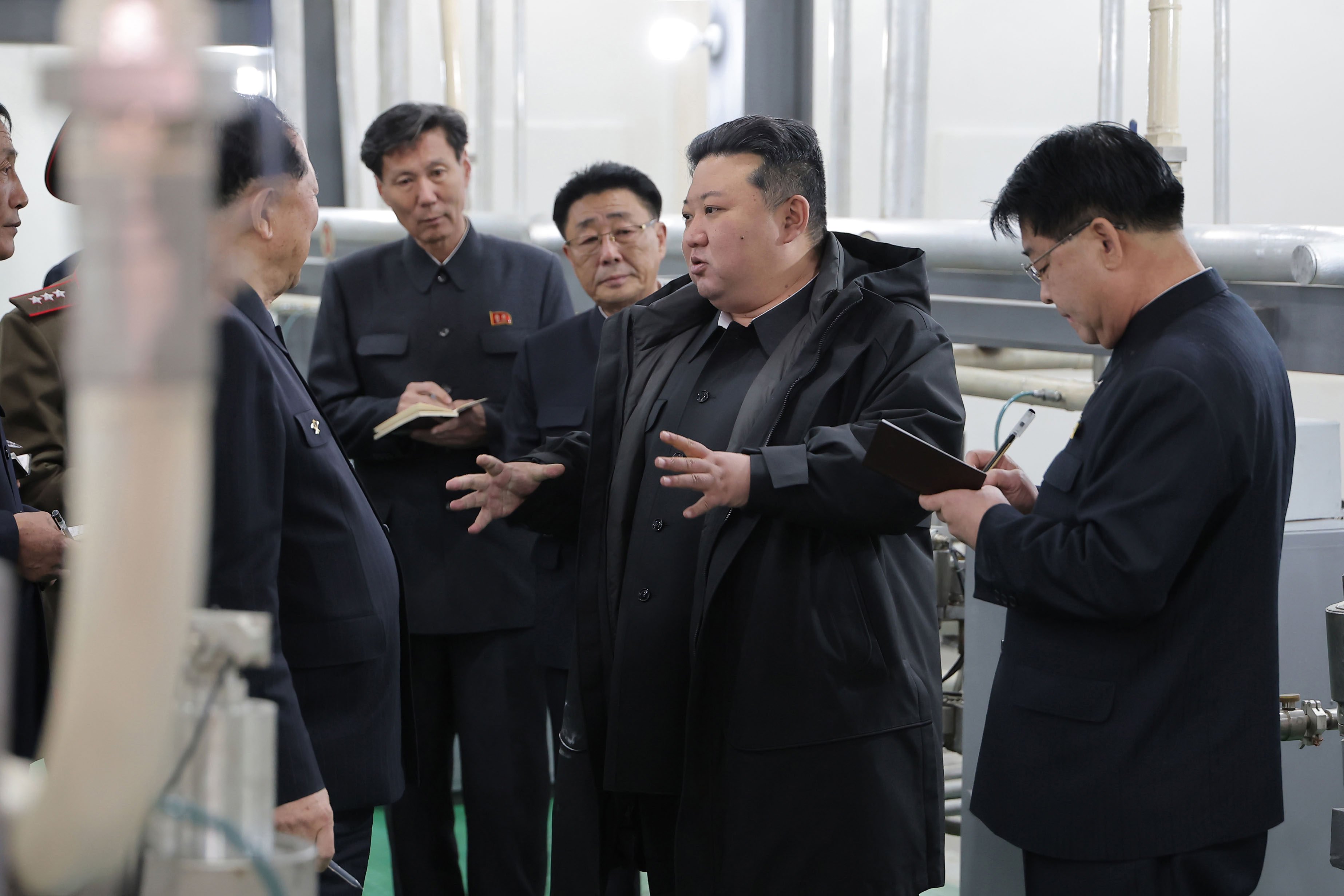 A picture released by the North Korean state news agency (KCNA) on Wednesday shows North Korean leader Kim Jong-un visiting a facility for the production of nuclear material at an undisclosed location. Photo: DPA