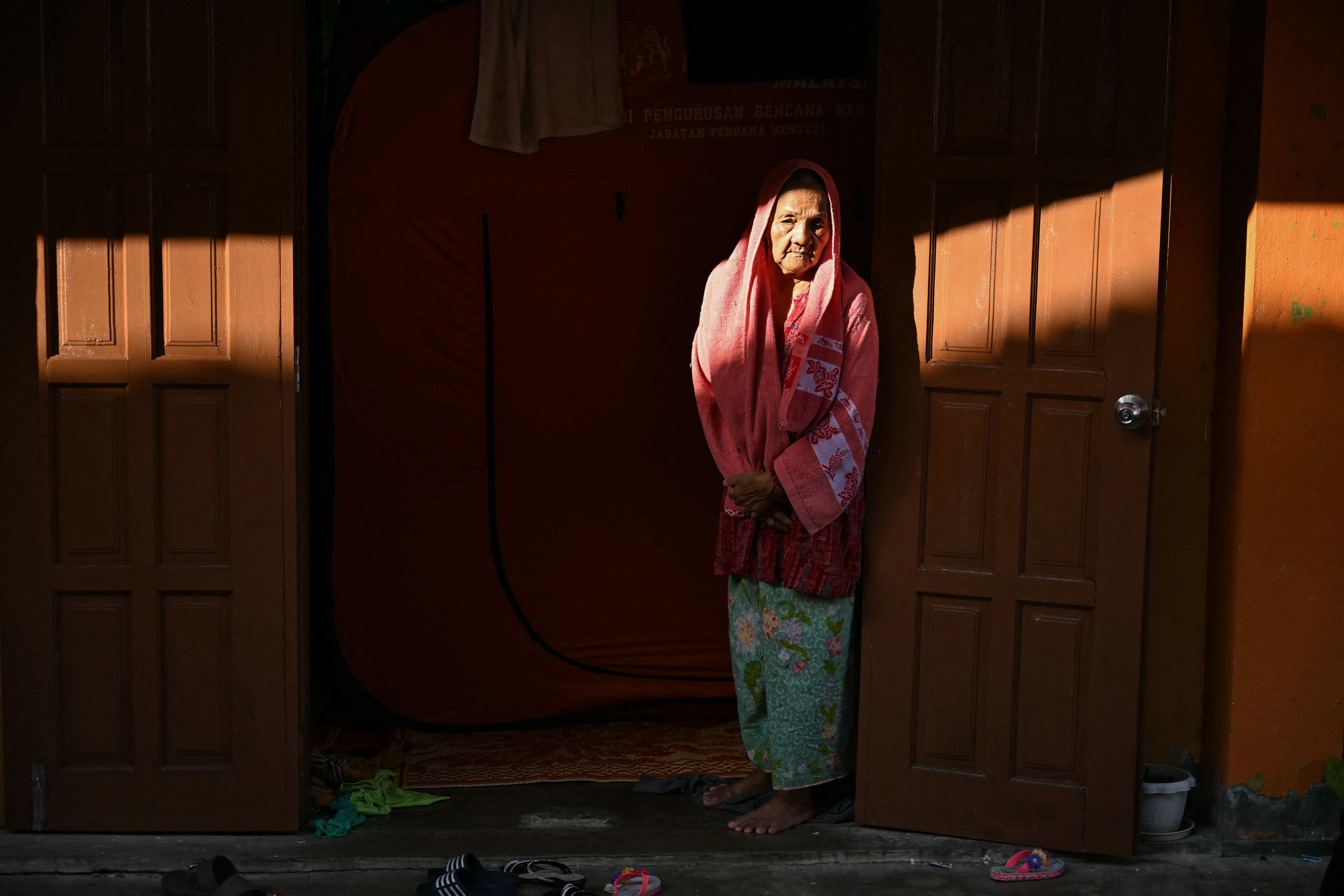 An elderly woman is seen in Pasir Mas, Malaysia’s Kelantan state. Photo: AFP