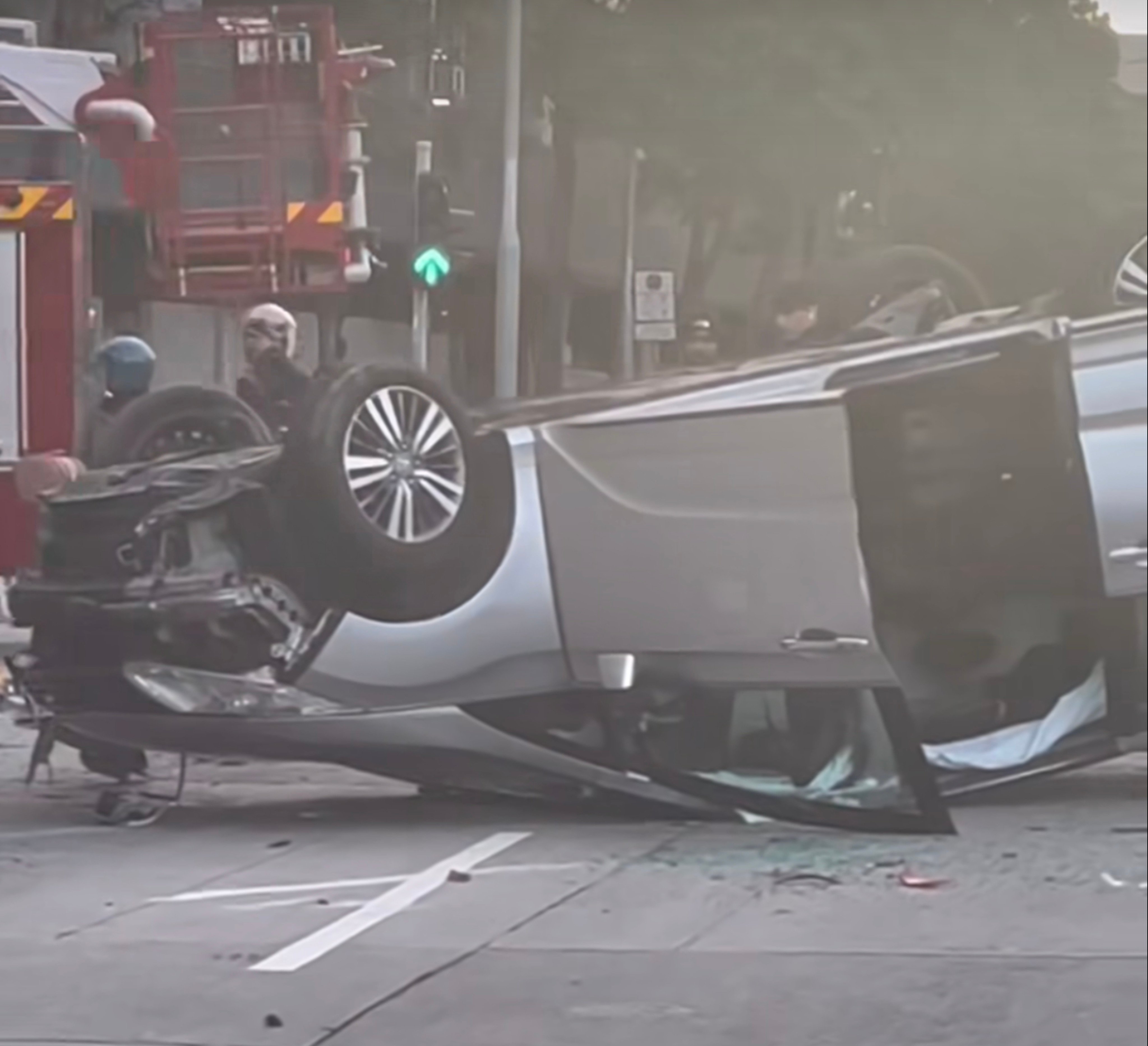 The vehicle hit an eight-metre-long railing and flipped over onto its roof. Photo: Handout