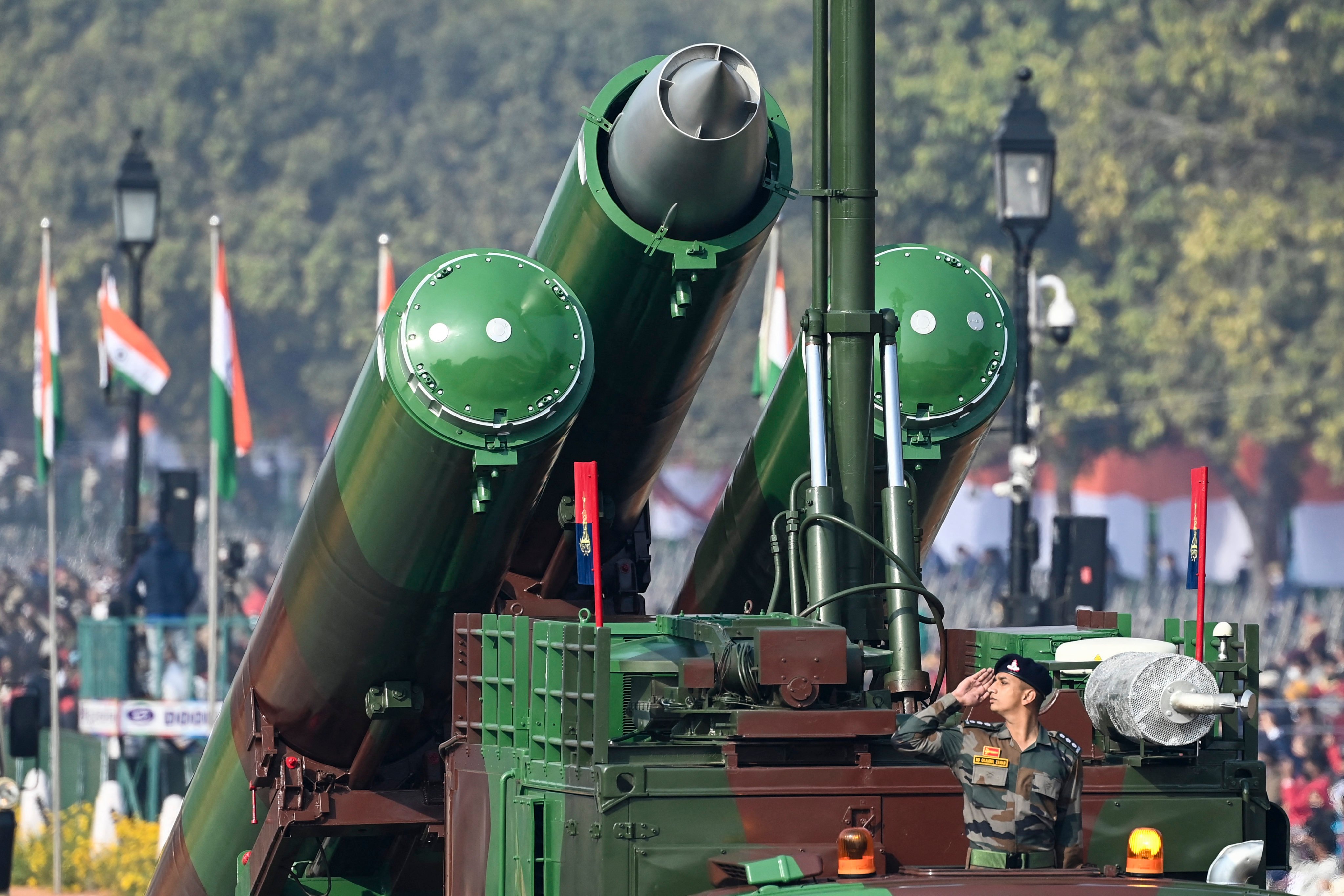 A soldier salutes from a BrahMos Weapon system during the Republic Day parade in New Delhi on January 26, 2021 Photo: AFP