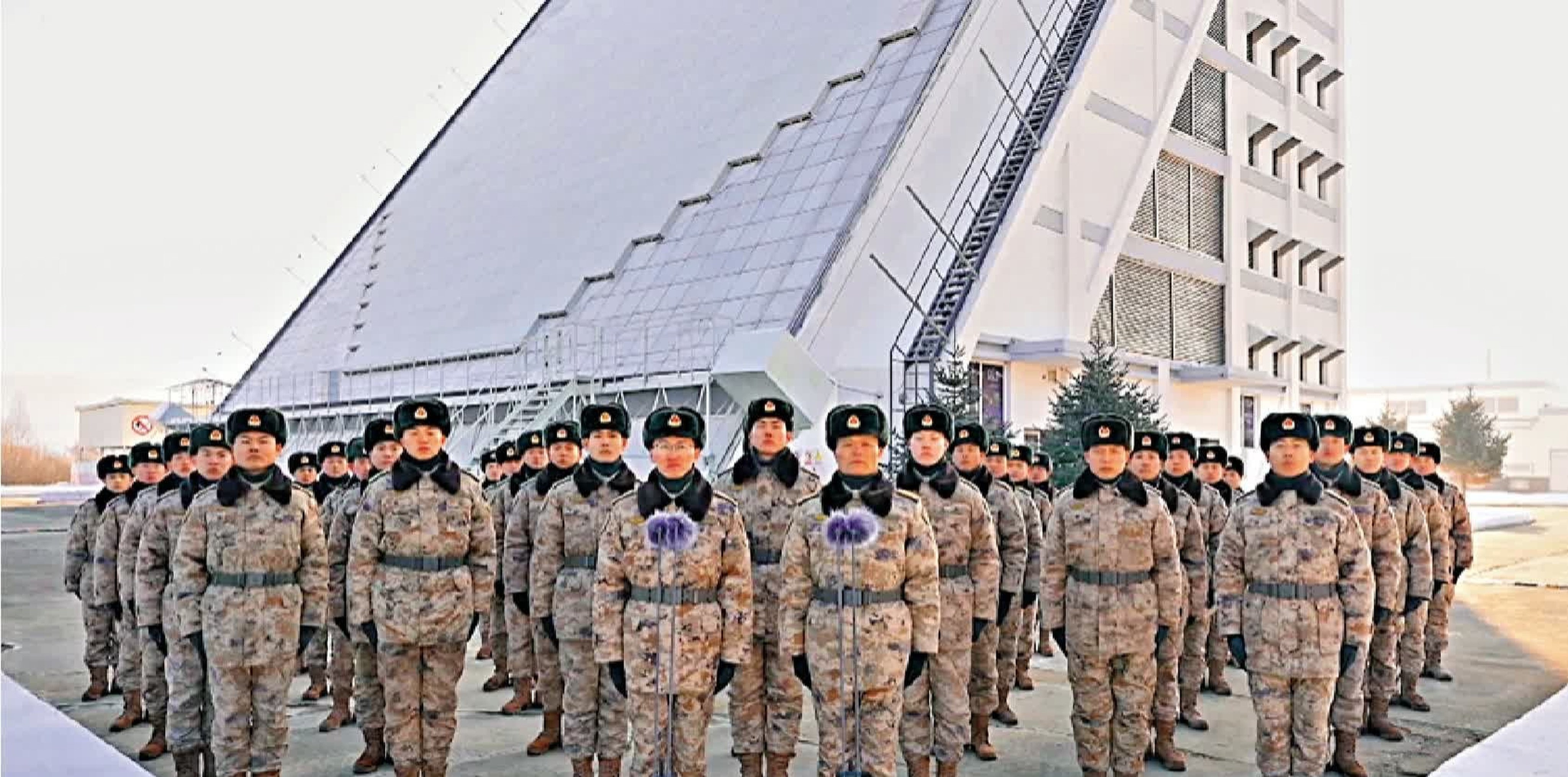 PLA Aerospace Force members, with the ground-based phased-array radar station in the background, in the video sent to Xi Jinping. Photo: Handout