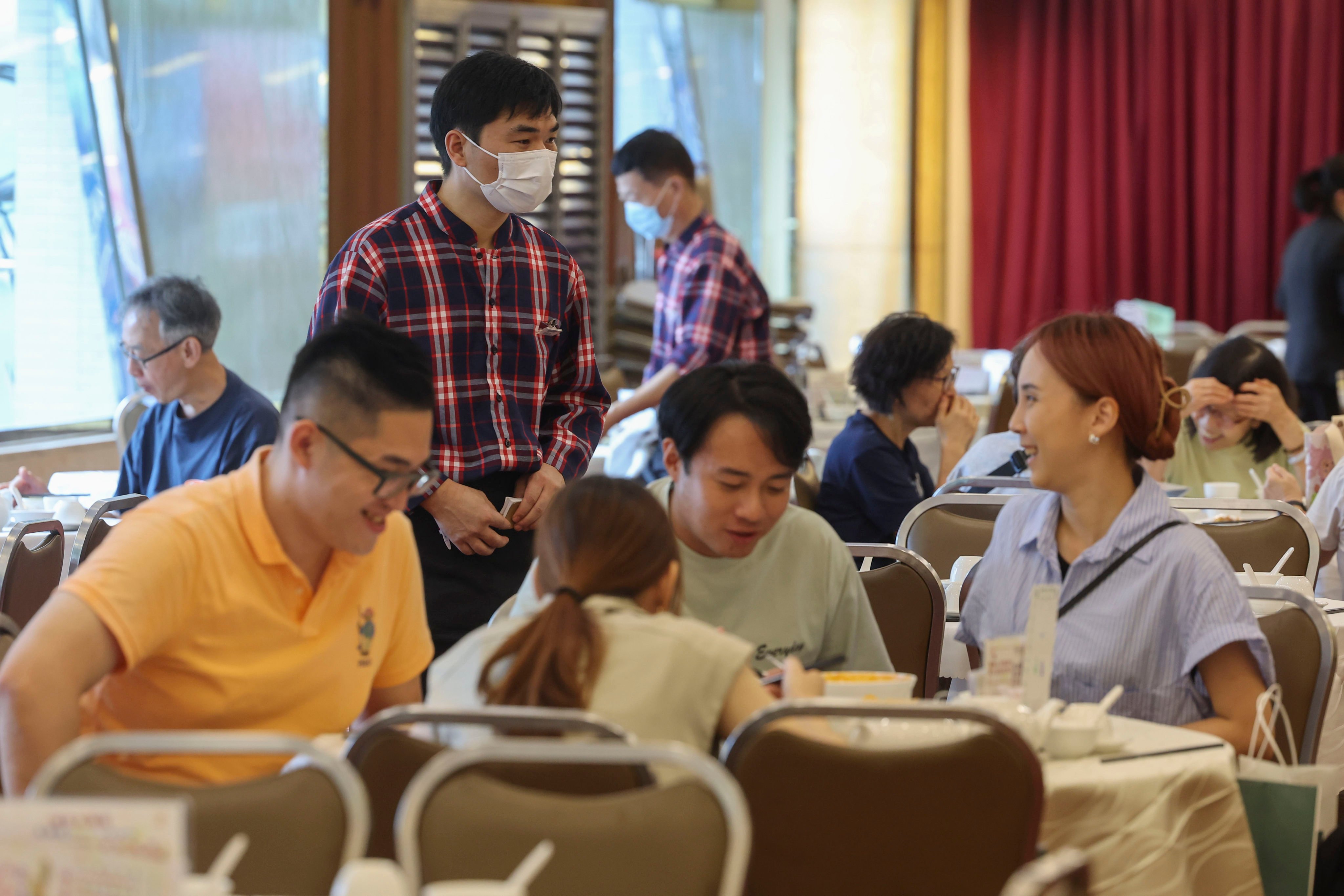 People dine at a restaurant in Mong Kok. Photo: Edmond So