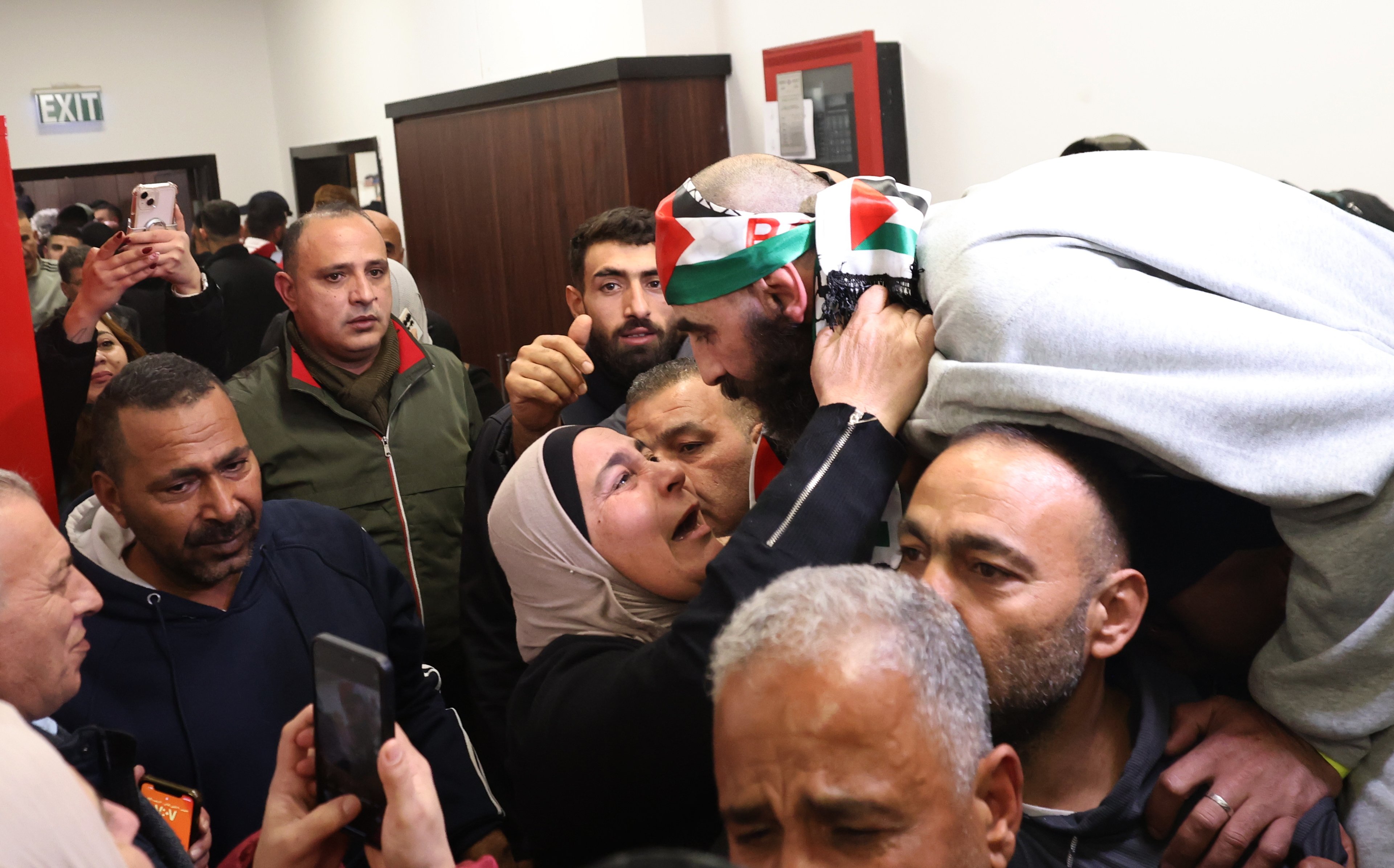 A Palestinian former detainee is greeted by family and friends as he arrives in Ramallah on Thursday. Photo: EPA-EFE