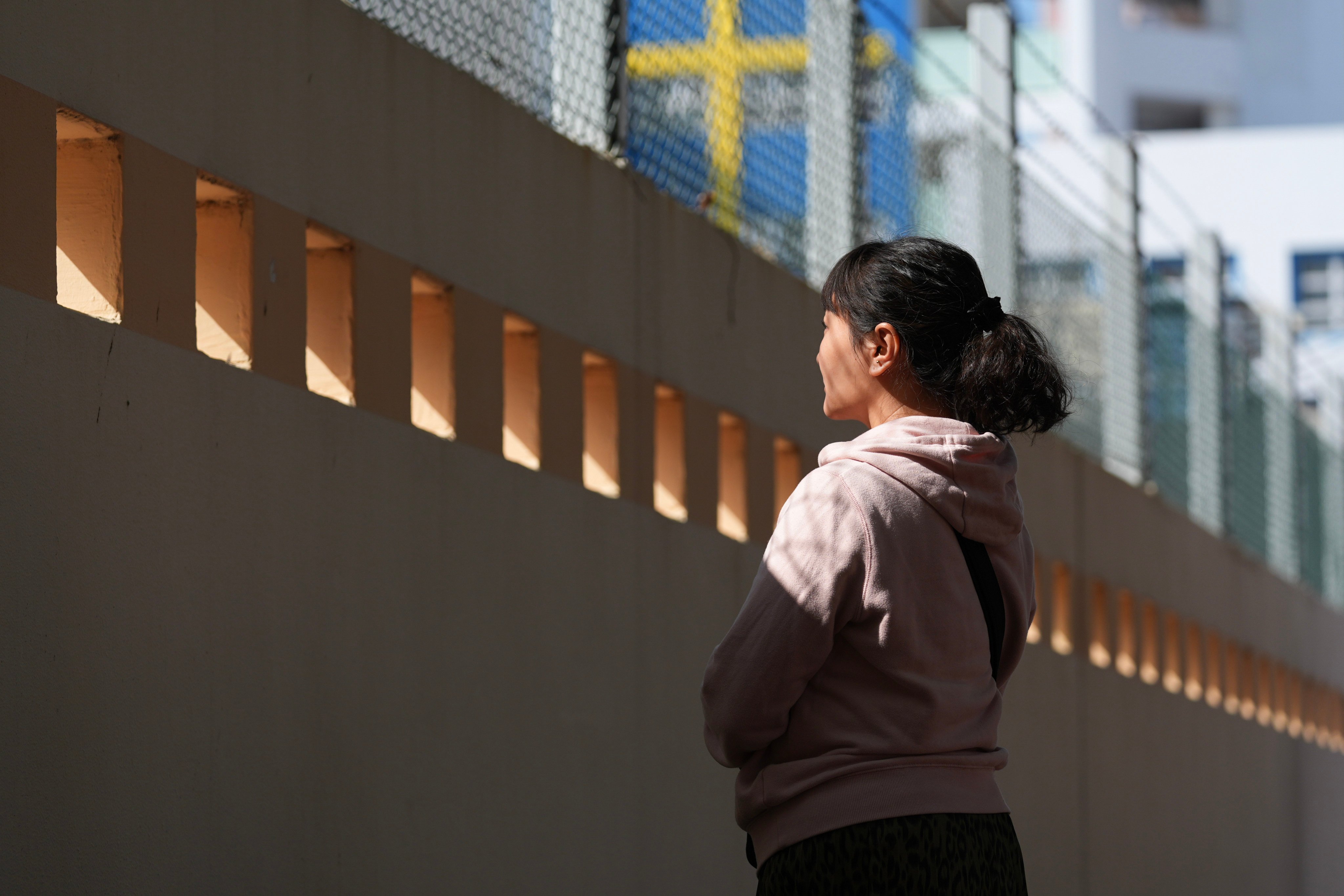 Beautician Lam has two children, aged eight and four, with her late husband. Photo: Eugene Lee