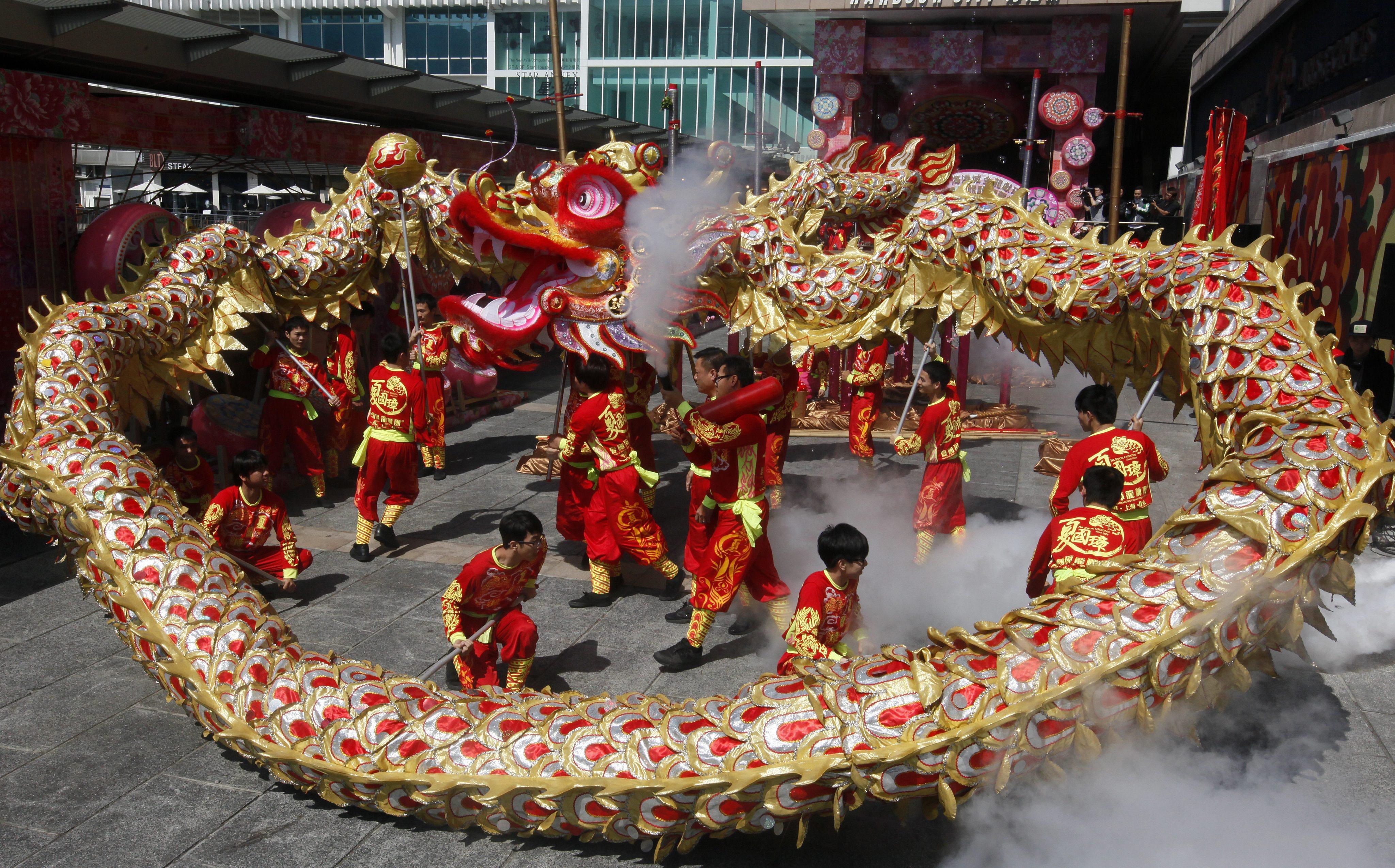 The vibrant dragon dance, a traditional Chinese performance, symbolises prosperity and wards off evil spirits. Photo: EPA