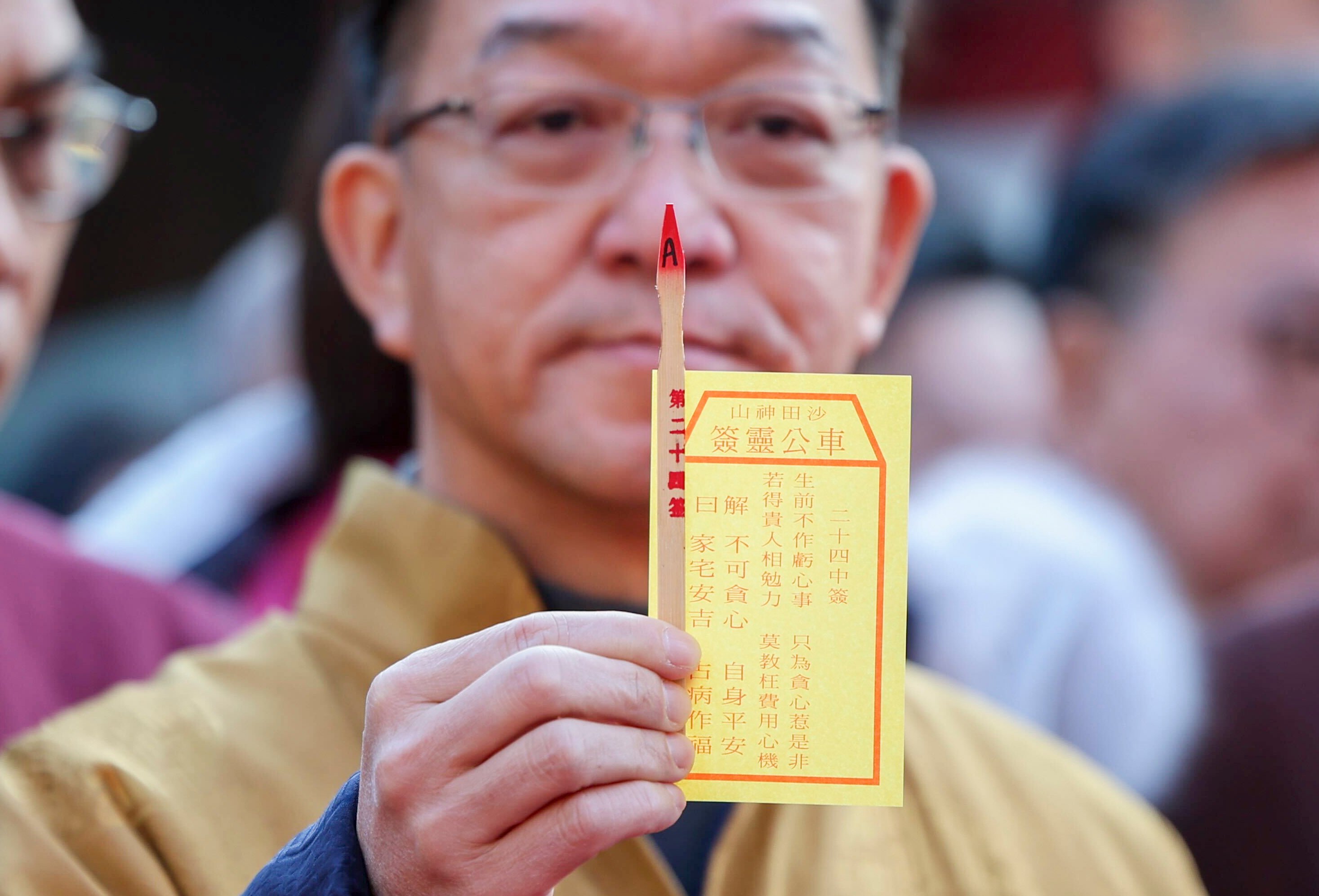 A rural chief has drawn the No 24 “neutral” fortune stick. Photo: Dickson Lee
