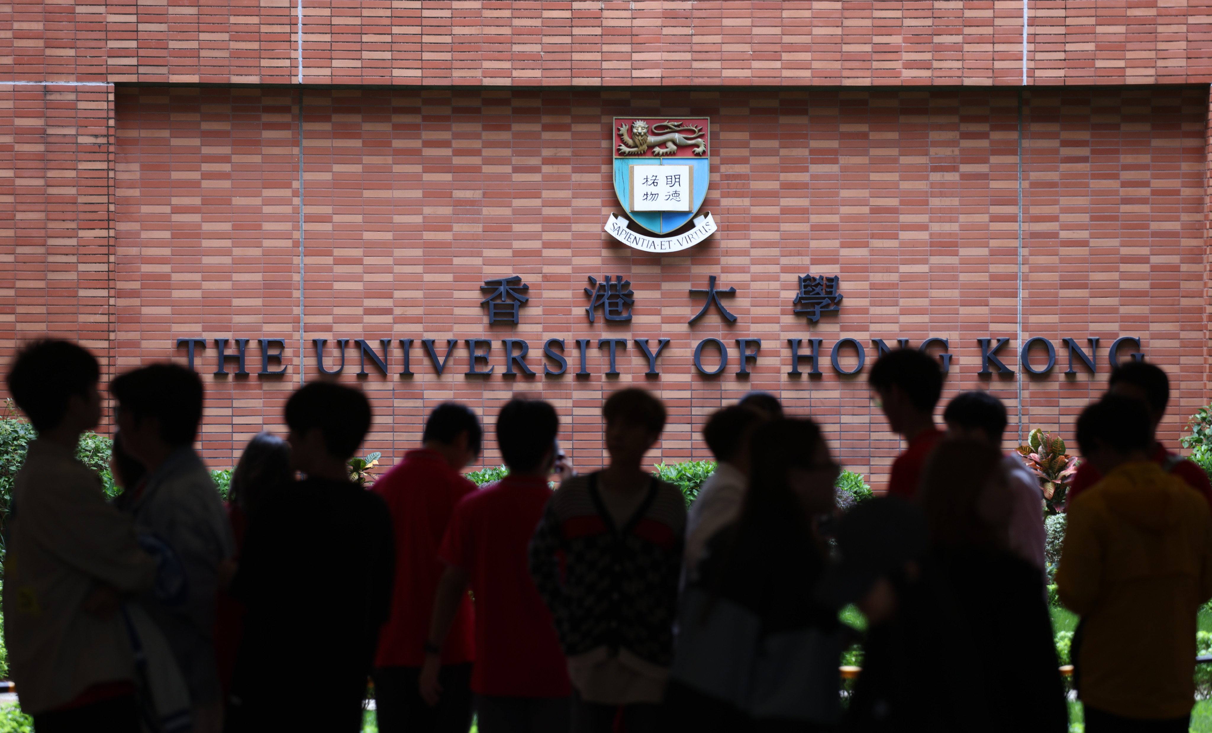 Visitors at the campus of the University of Hong Kong. Mainland students in the city have been targeted by fraudsters. Photo: Yik Yeung-man