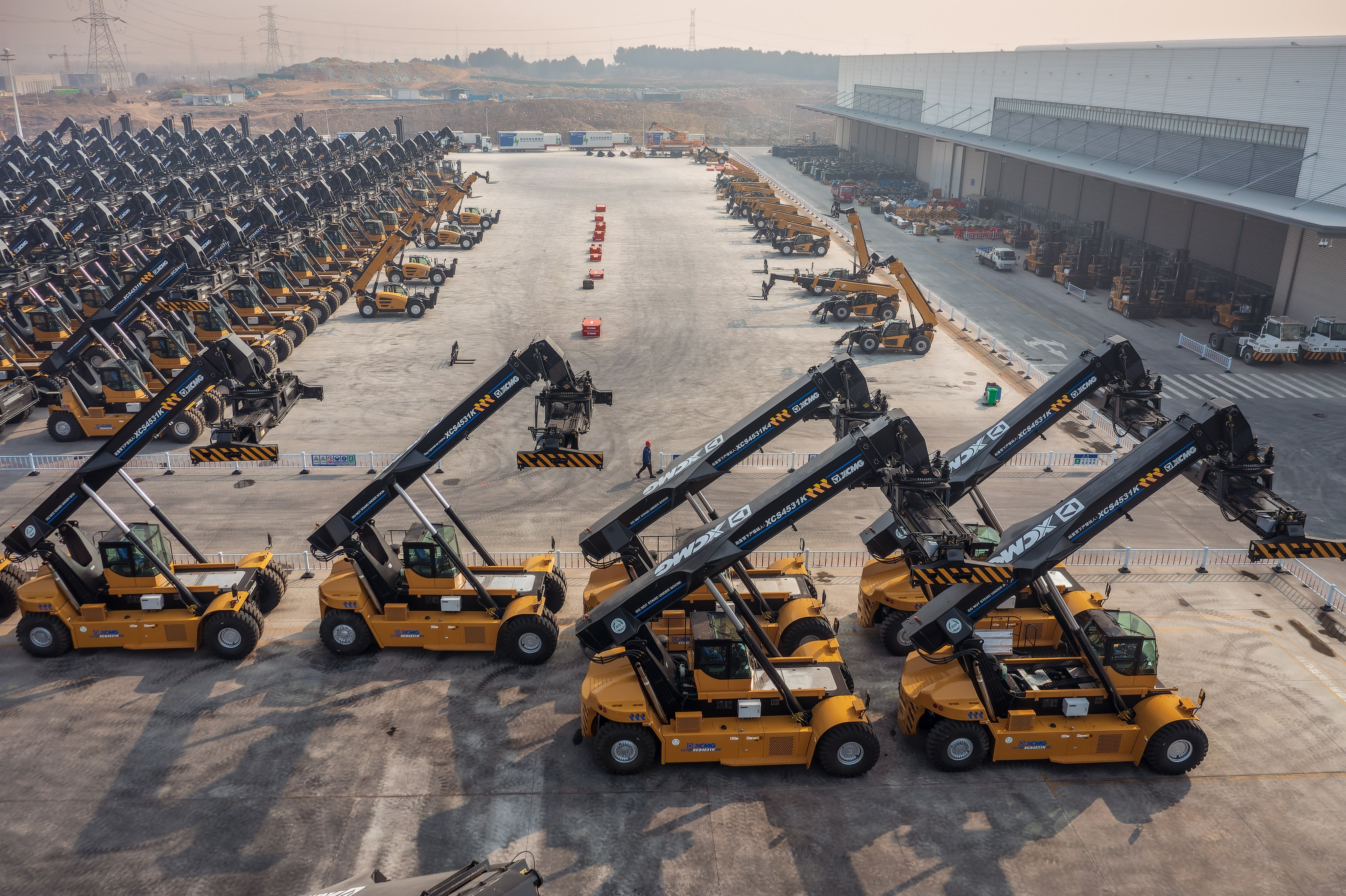 Construction vehicles at Xuzhou XCMG Port Machinery factory in Xuzhou, China, Photo: EPA-EFE/ALEX PLAVEVSKI