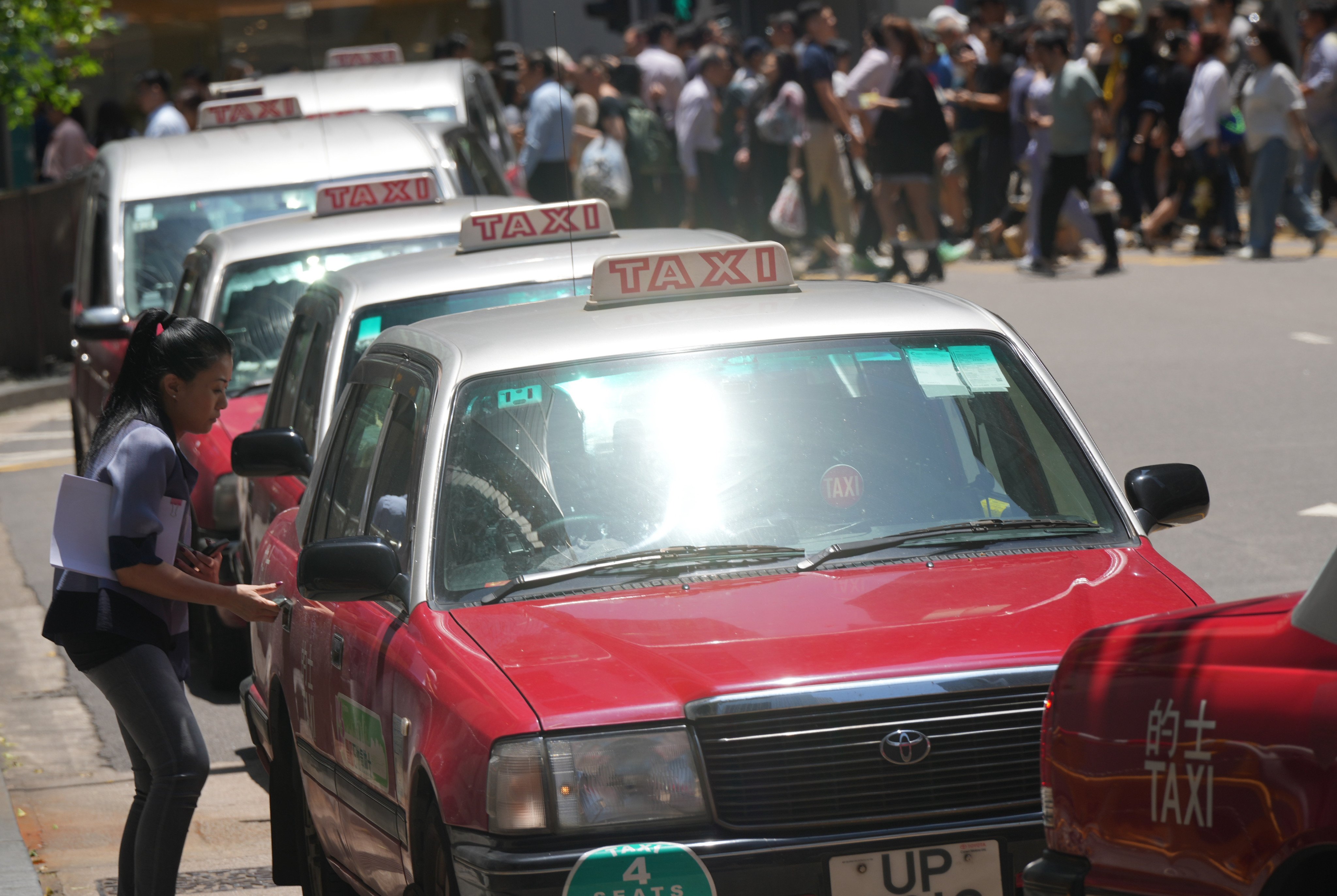 A row of cabs at a taxi rank in Central. The Transport Department has announced the Taxi Service Commendation Scheme 2024 is open for public voting. Photo: May Tse