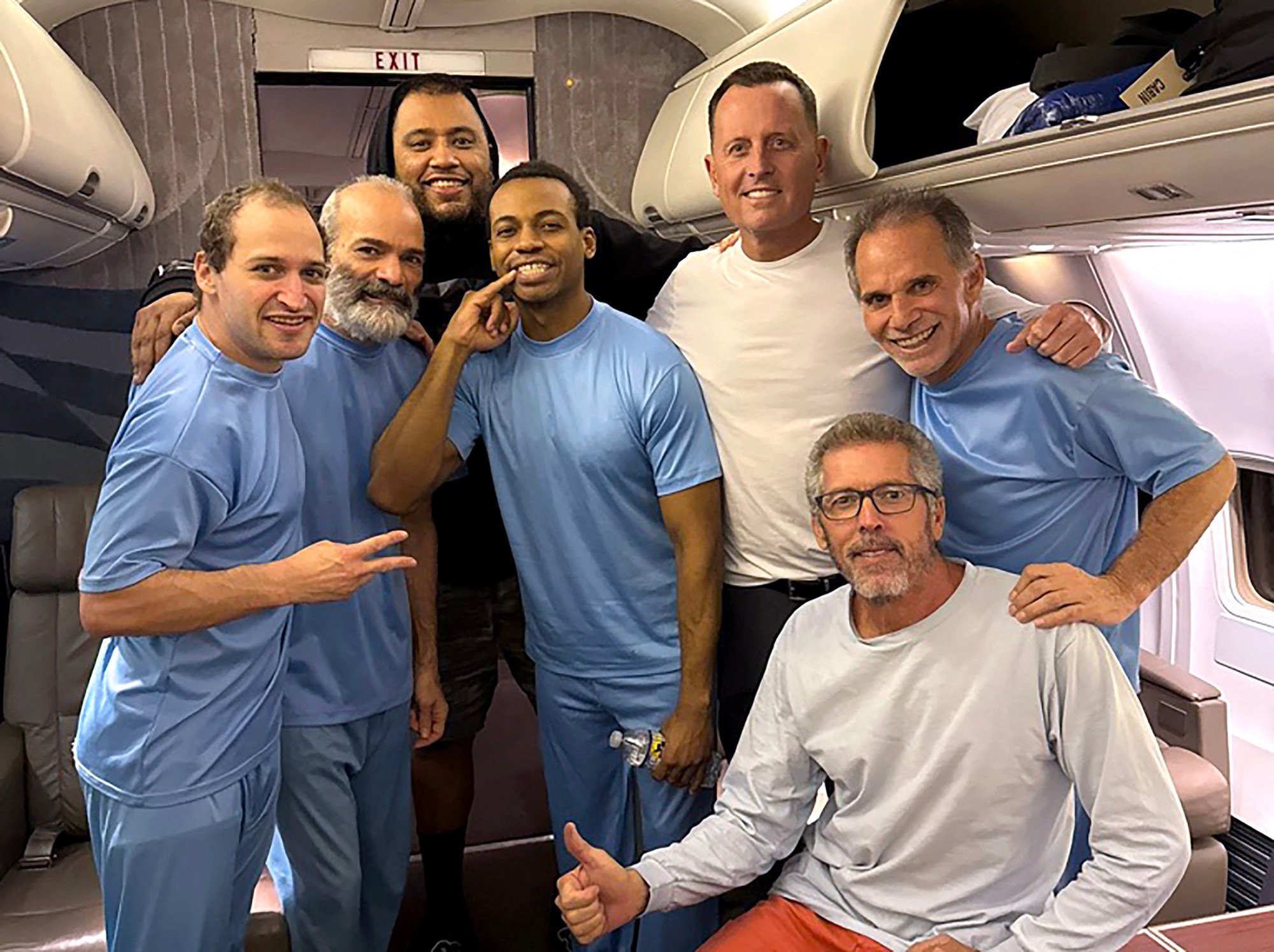 An X post by Richard Grenell, US President Donald Trump’s envoy, shows him (third from right) posing alongside six US citizens released from detention in Venezuela. Photo: AFP