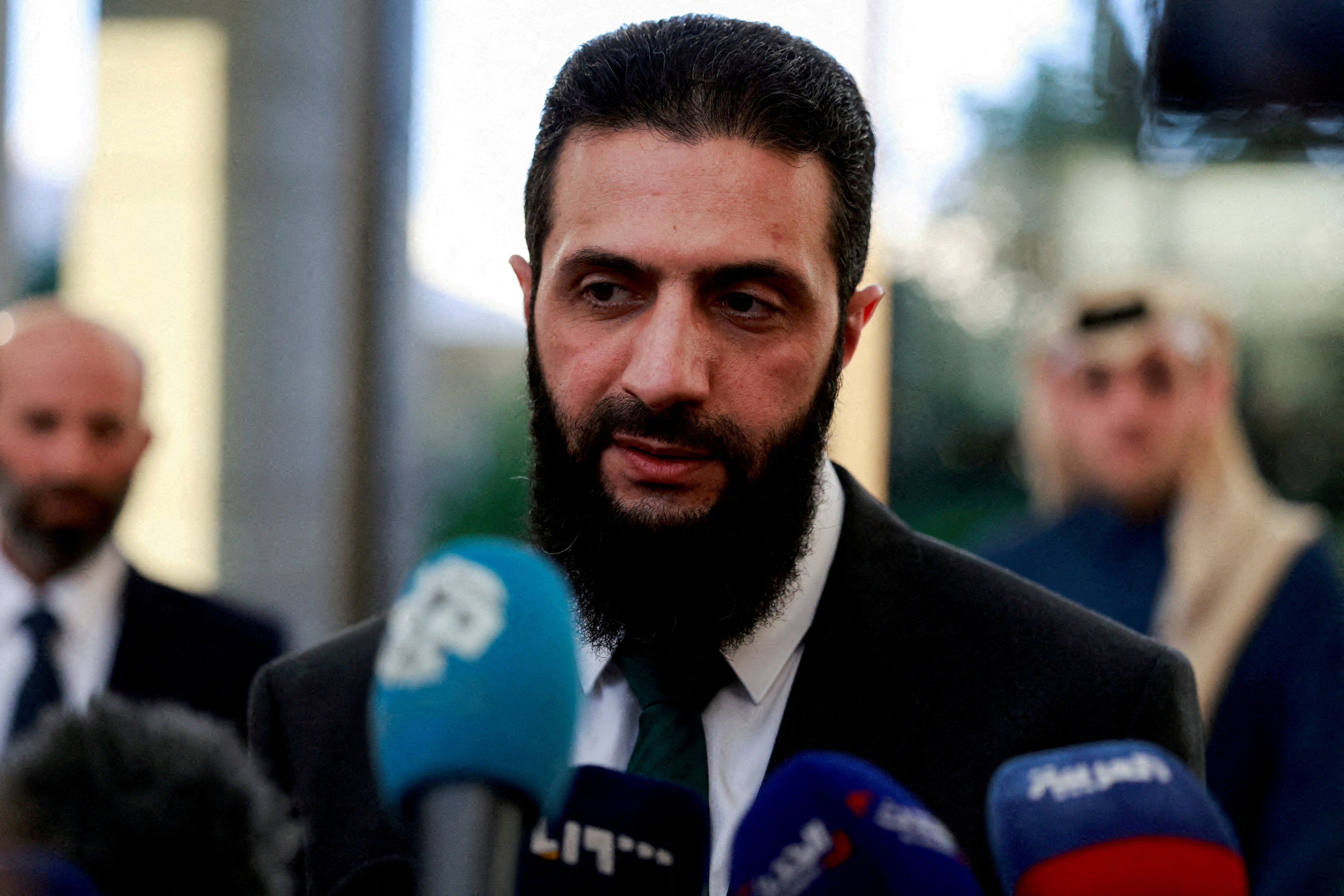 Syria’s then-de facto leader Ahmed al-Sharaa, also known as Abu Mohammed al-Golani, speaking to the media during a meeting with Qatar’s Minister of State, in Damascus, Syria, on December 23. Photo: Reuters