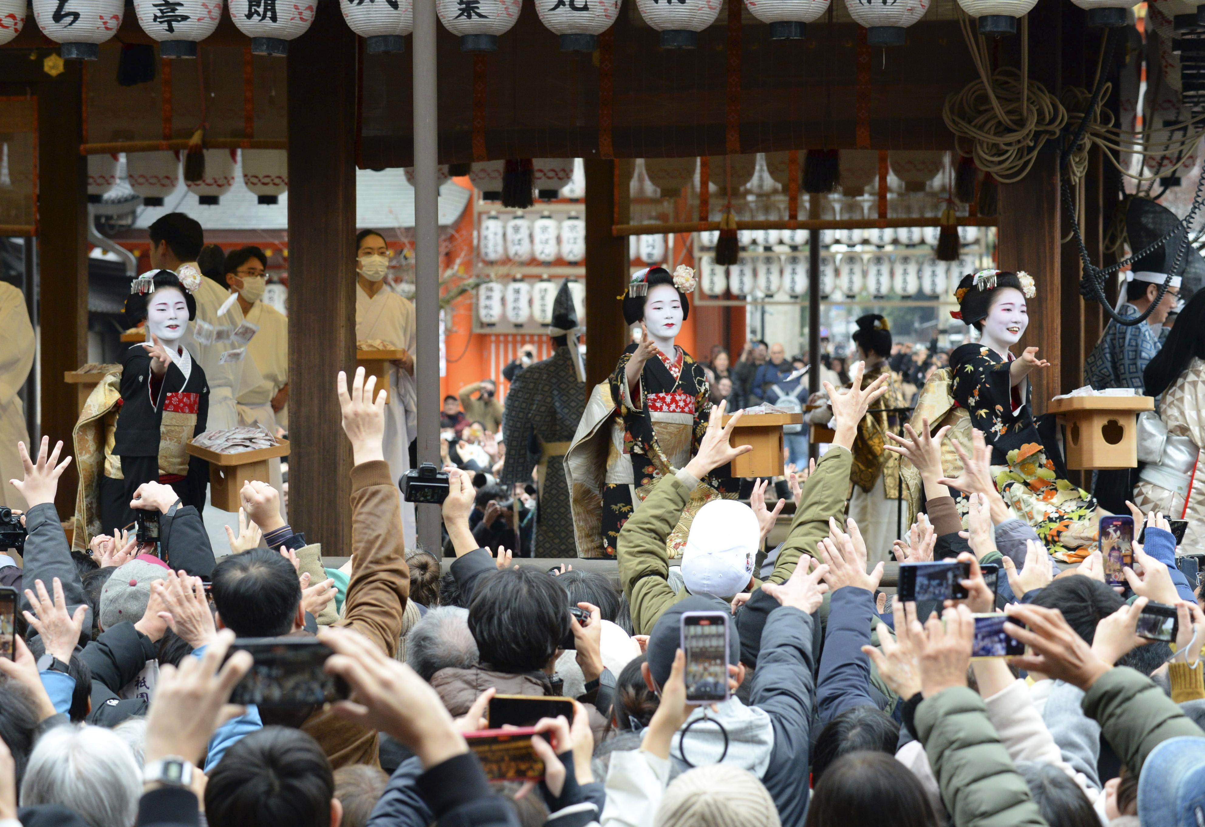 Hundreds gathered at Tokyo’s Zojoji temple for the annual “mame-maki” bean-throwing event to drive away evil spirits and bring good luck. Photo: Kyodo