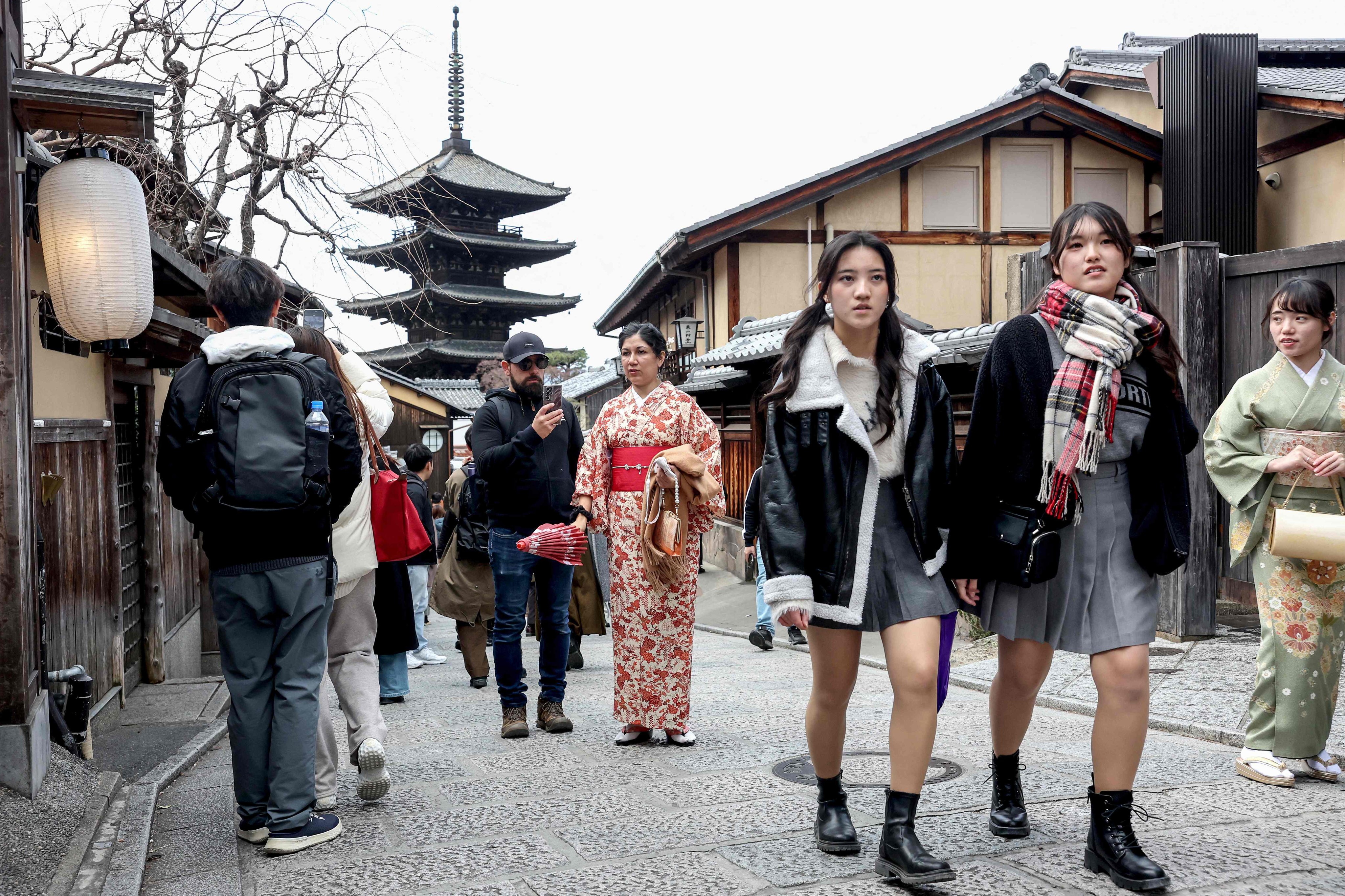 Tourists in Kyoto, Japan. Several travel destinations popular with Hongkongers are undergoing flu surges, including Japan. Photo: AFP 