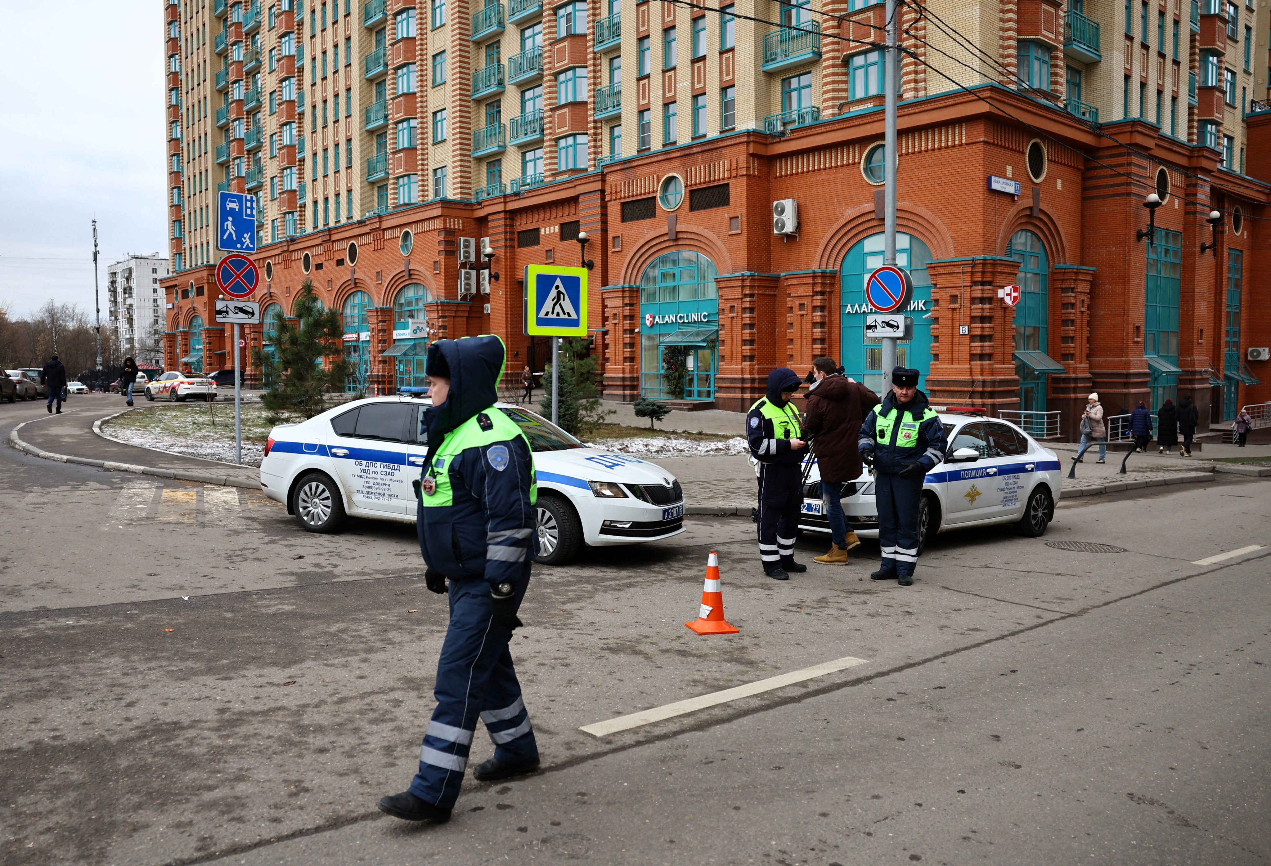 Traffic police officers patrol near the site of a blast in a residential building in Moscow. The bomb detonated in a building just 12km (7 miles) from the Kremlin. Photo: Reuters