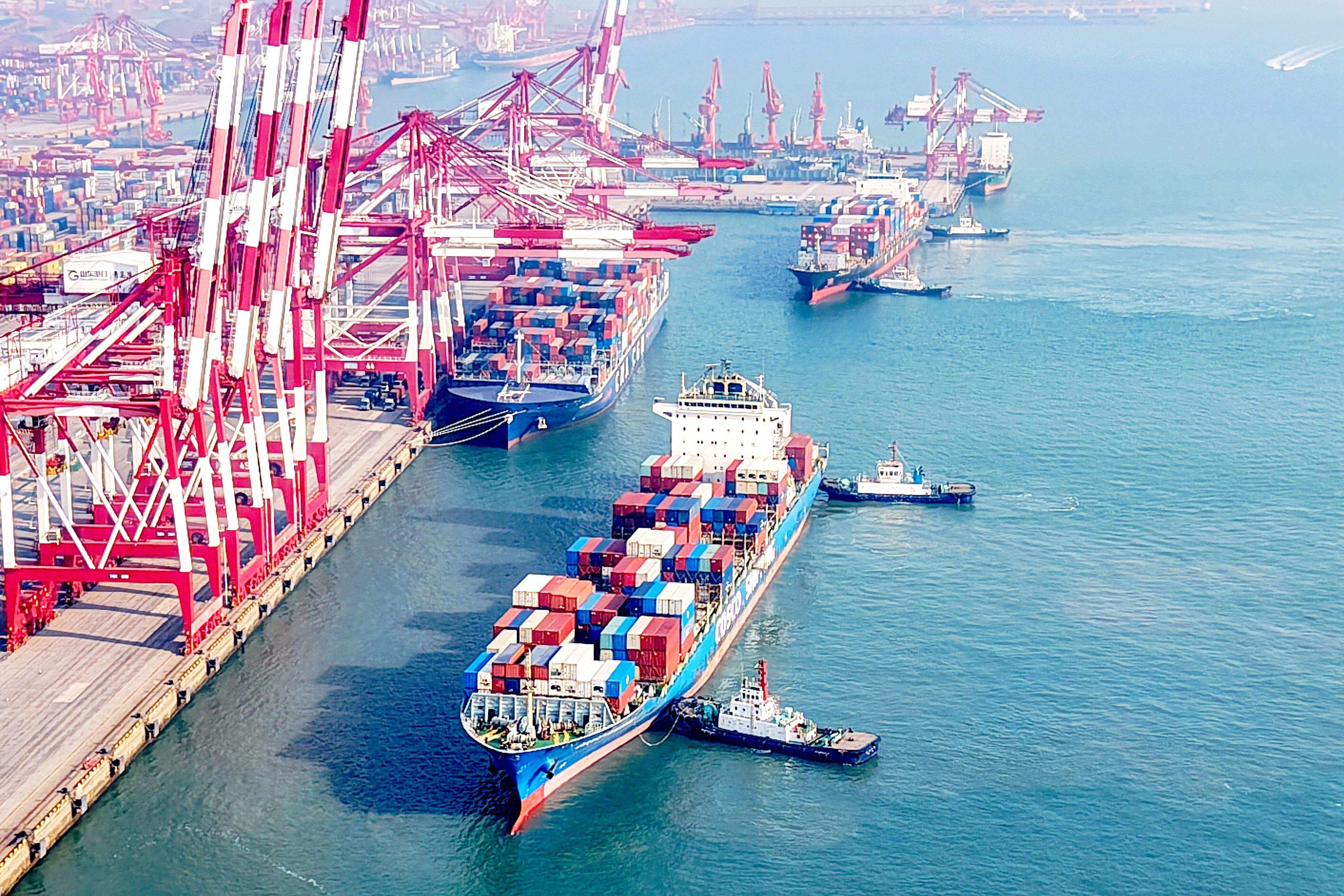 Cargo ships loaded with containers are seen berthing in Qingdao Port, east China’s Shandong province, last month. Photo: AFP