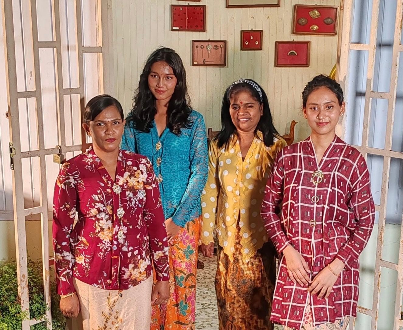 A group of women wearing traditional kebaya outfits in Melaka, Malaysia. Photo: Cedric Tan