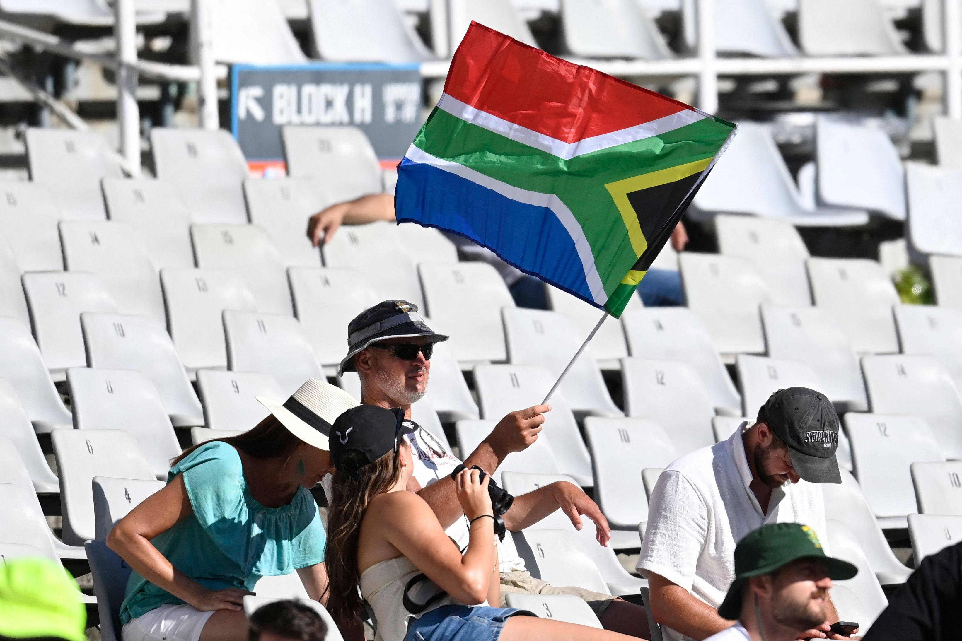 A supporter waves a South African flag during a cricket match between South Africa and Pakistan in Cape Town last month. Photo: AFP