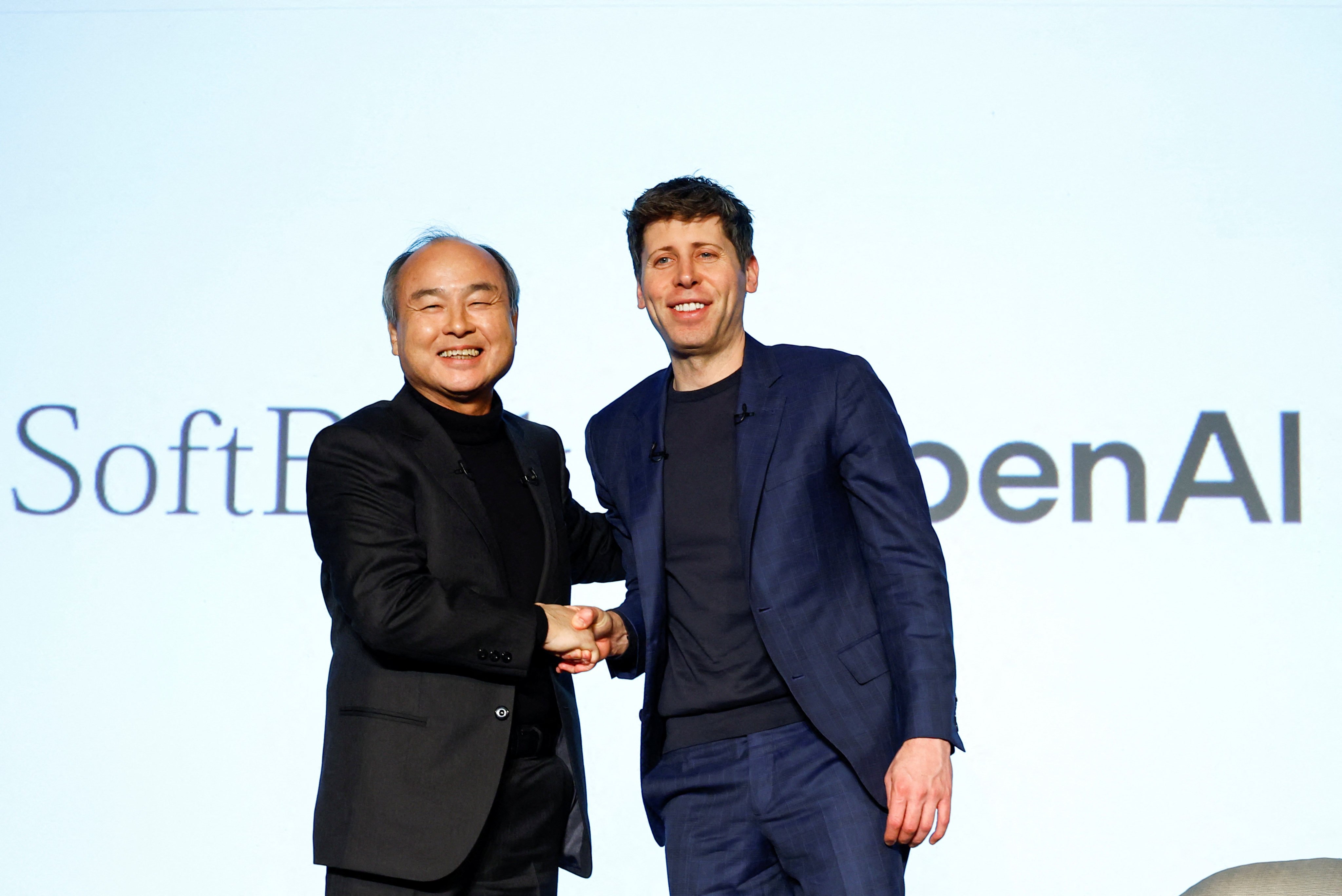 SoftBank CEO Masayoshi Son and OpenAI CEO Sam Altman attend an event to pitch AI for businesses in Tokyo on Monday. Photo: Reuters