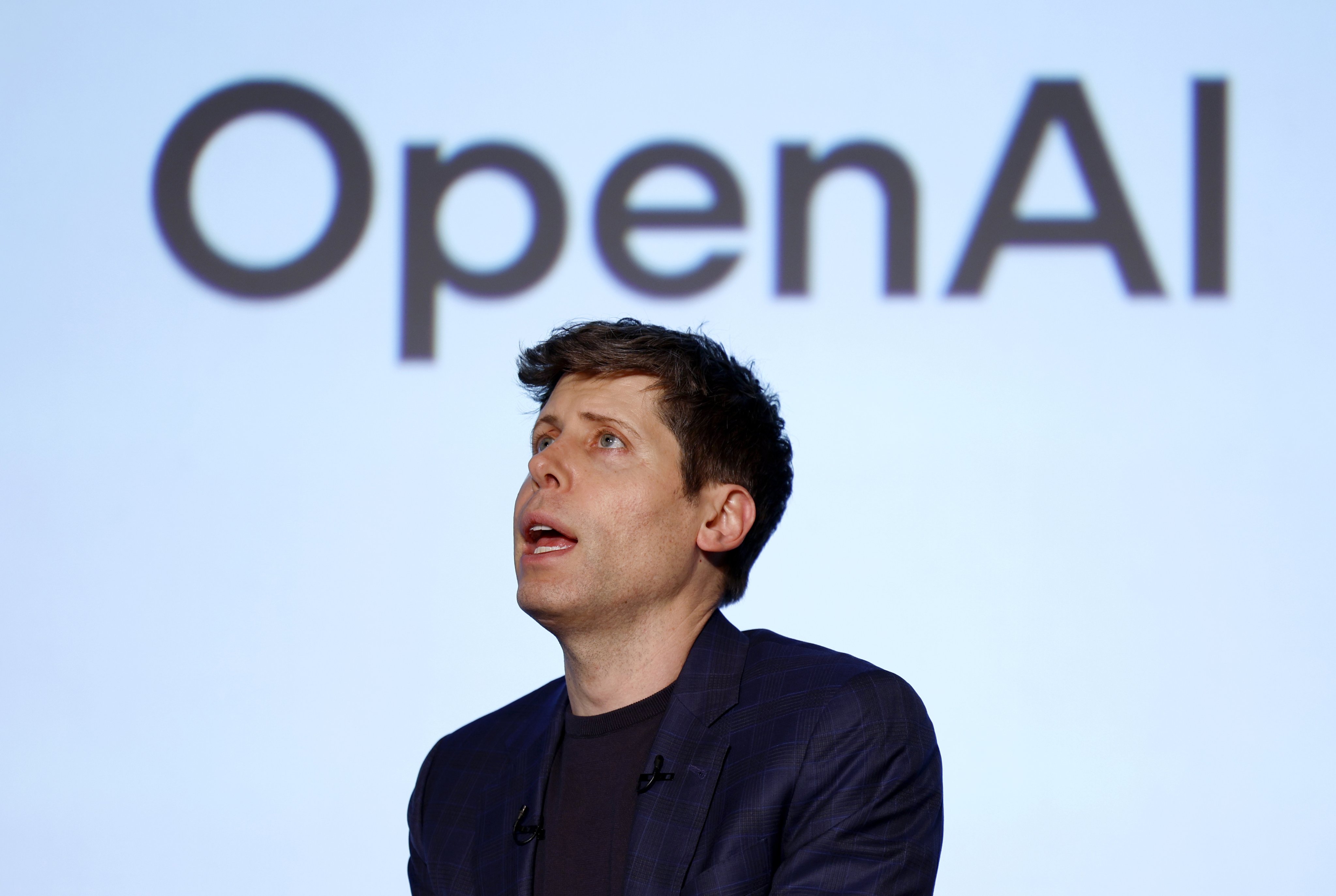 OpenAI CEO Sam Altman attends an event called ‘Transforming Business through AI’ with SoftBank in Tokyo on Monday. Photo: EPA-EFE