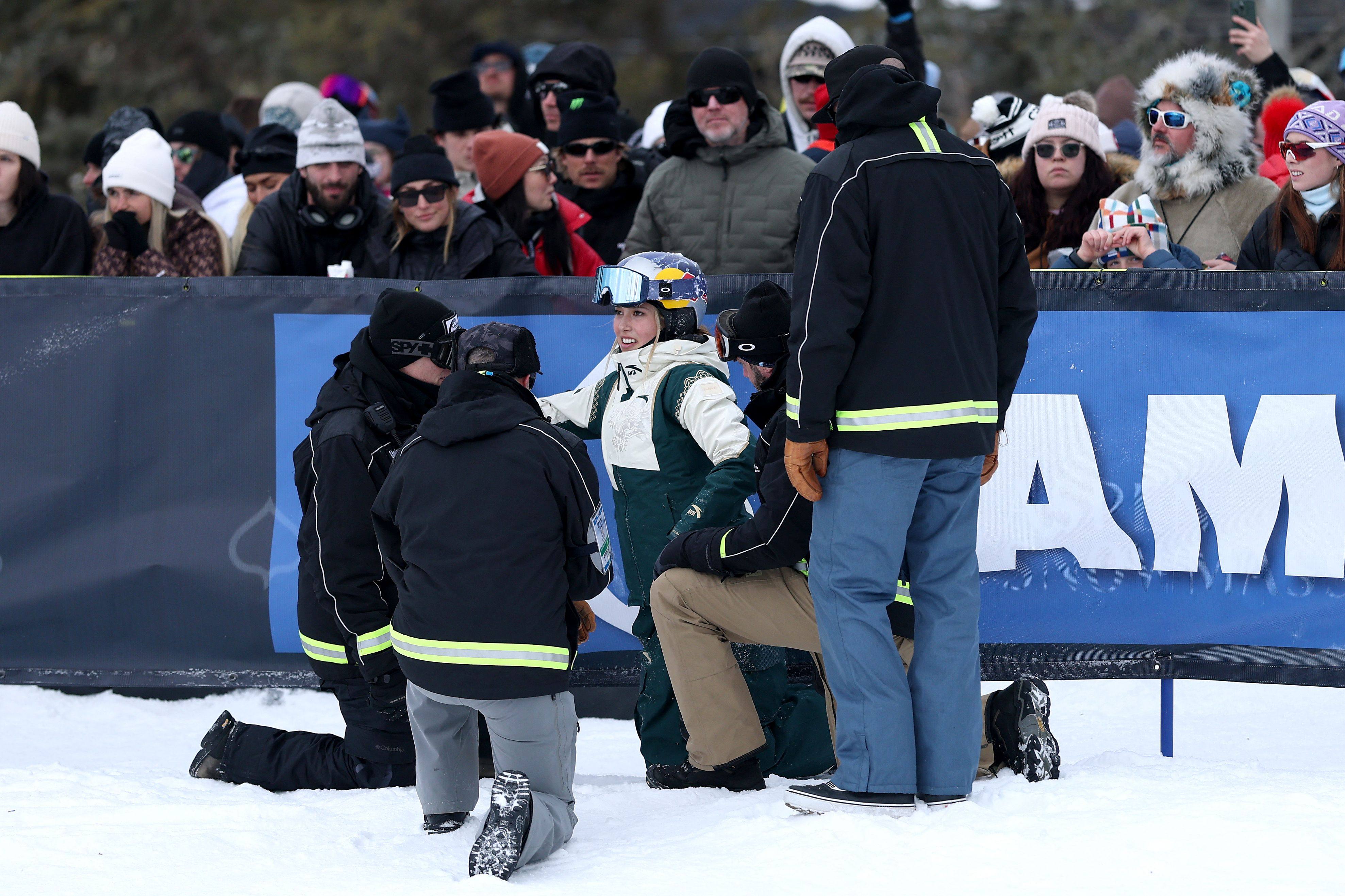 Eileen Gu is helped by medics after her initial injury during the X Games in Aspen on January 24. Photo: Getty Images via AFP