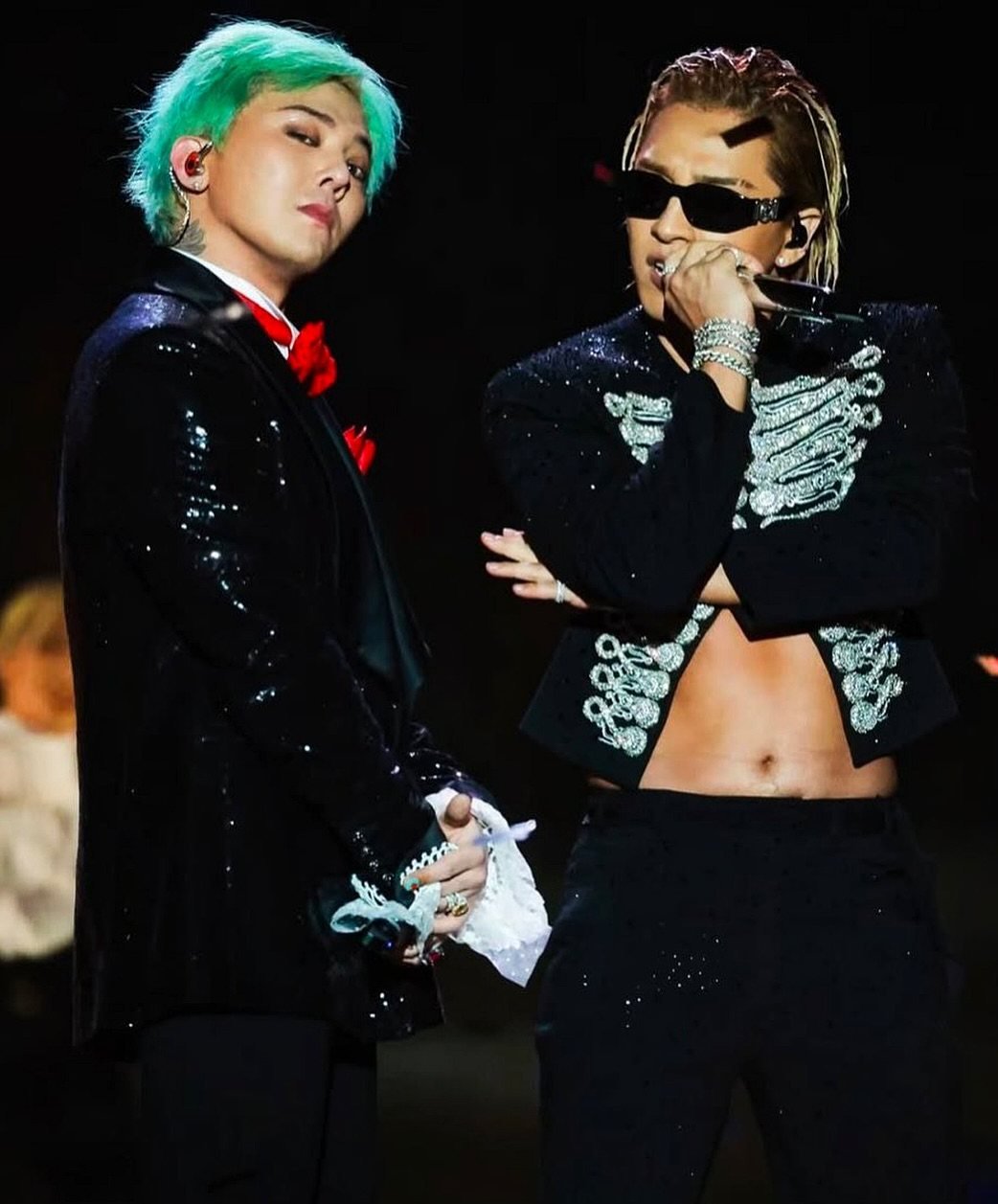 G-Dragon (left) and Taeyang of BigBang on stage at the latter’s concert in Incheon, South Korea, on February 1, during which their band mate Daesung revealed an upcoming G-Dragon concert. Photo: Instagram/bigbangram 